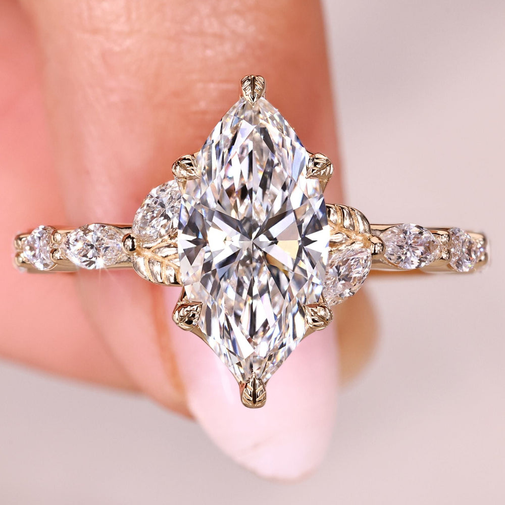 Marquise cut diamond ring pave nature style.
