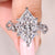 Dutch marquise diamond ring with side stones.
