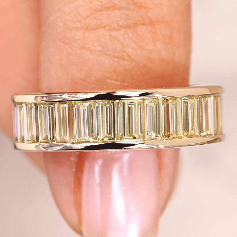 Channel setting band with baguette yellow diamonds.
