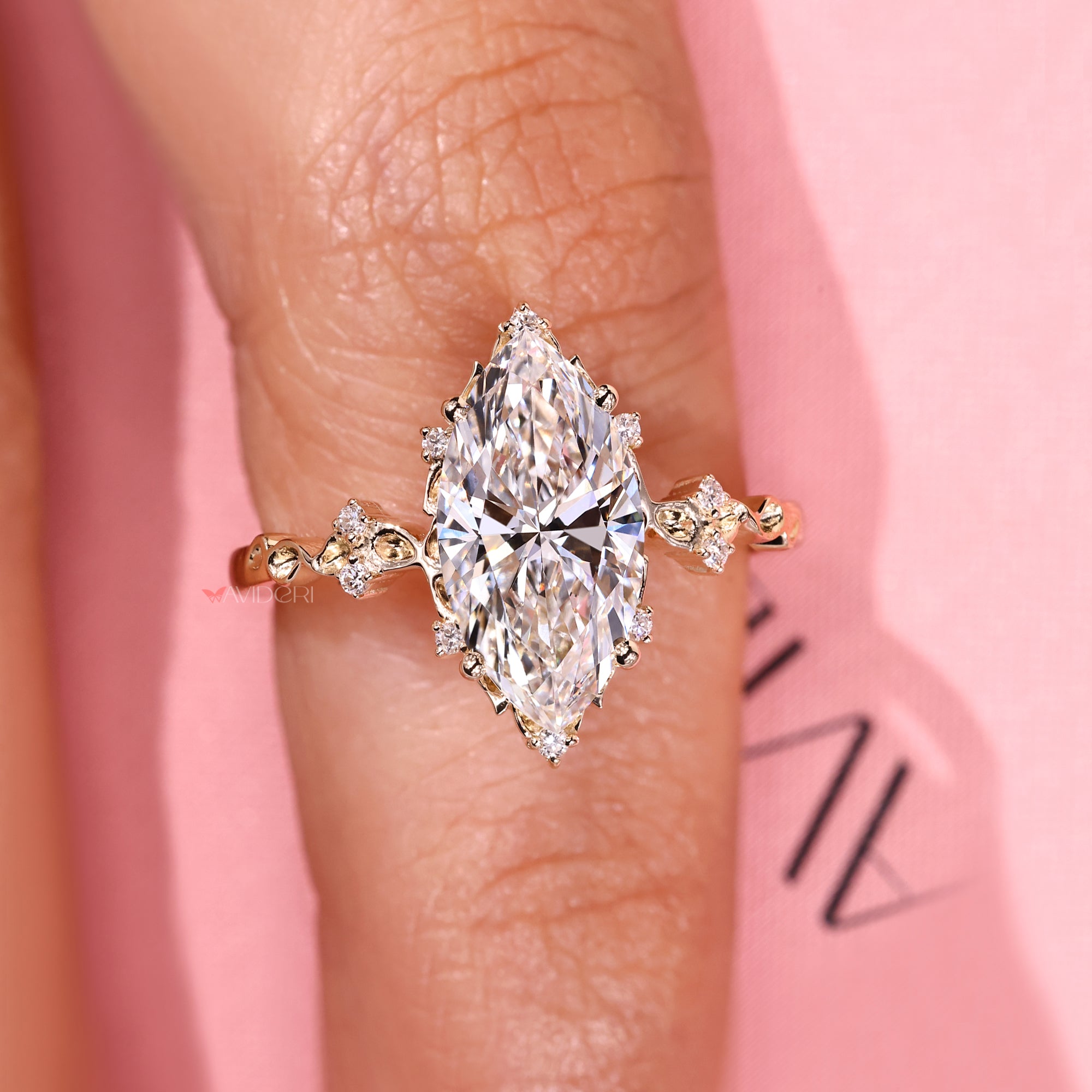 Buy engagement ring with diamond cluster design.