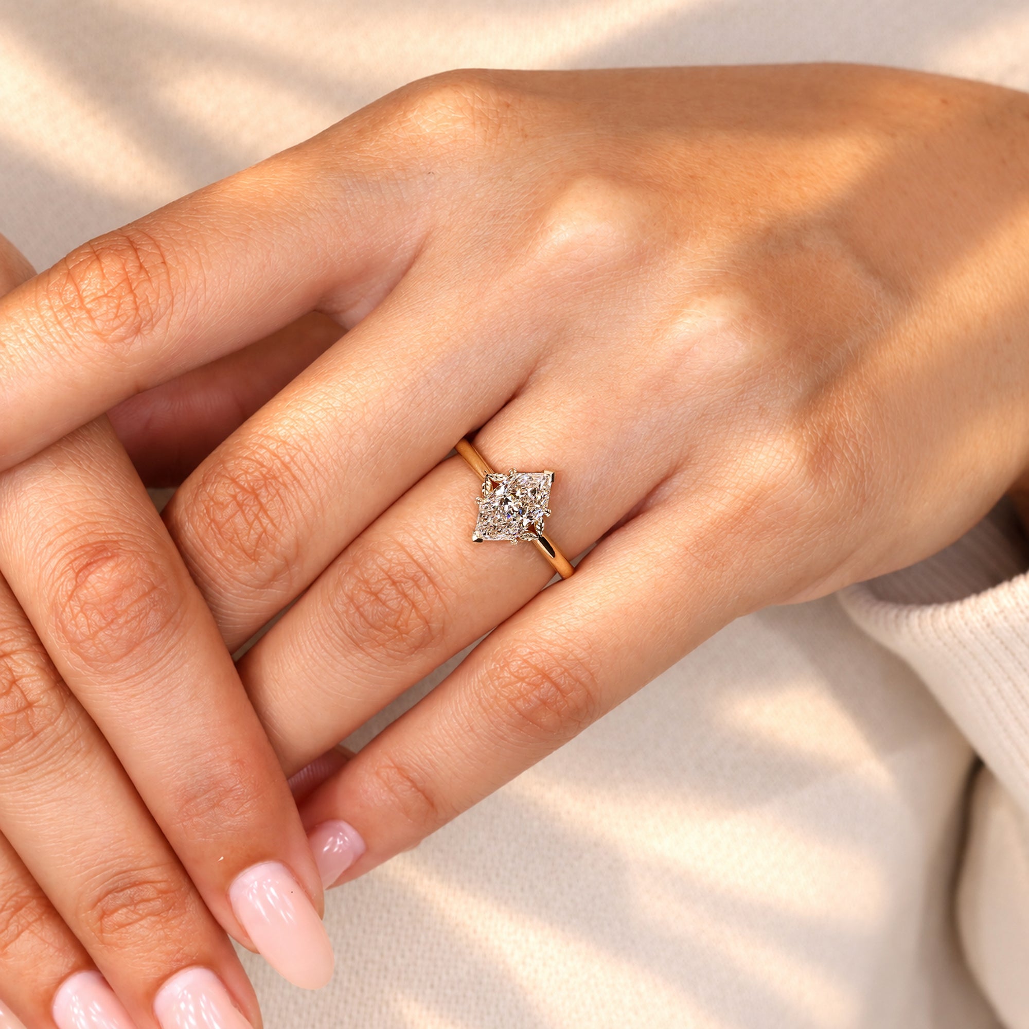 Dutch marquise solitaire ring with leaf style setting.
