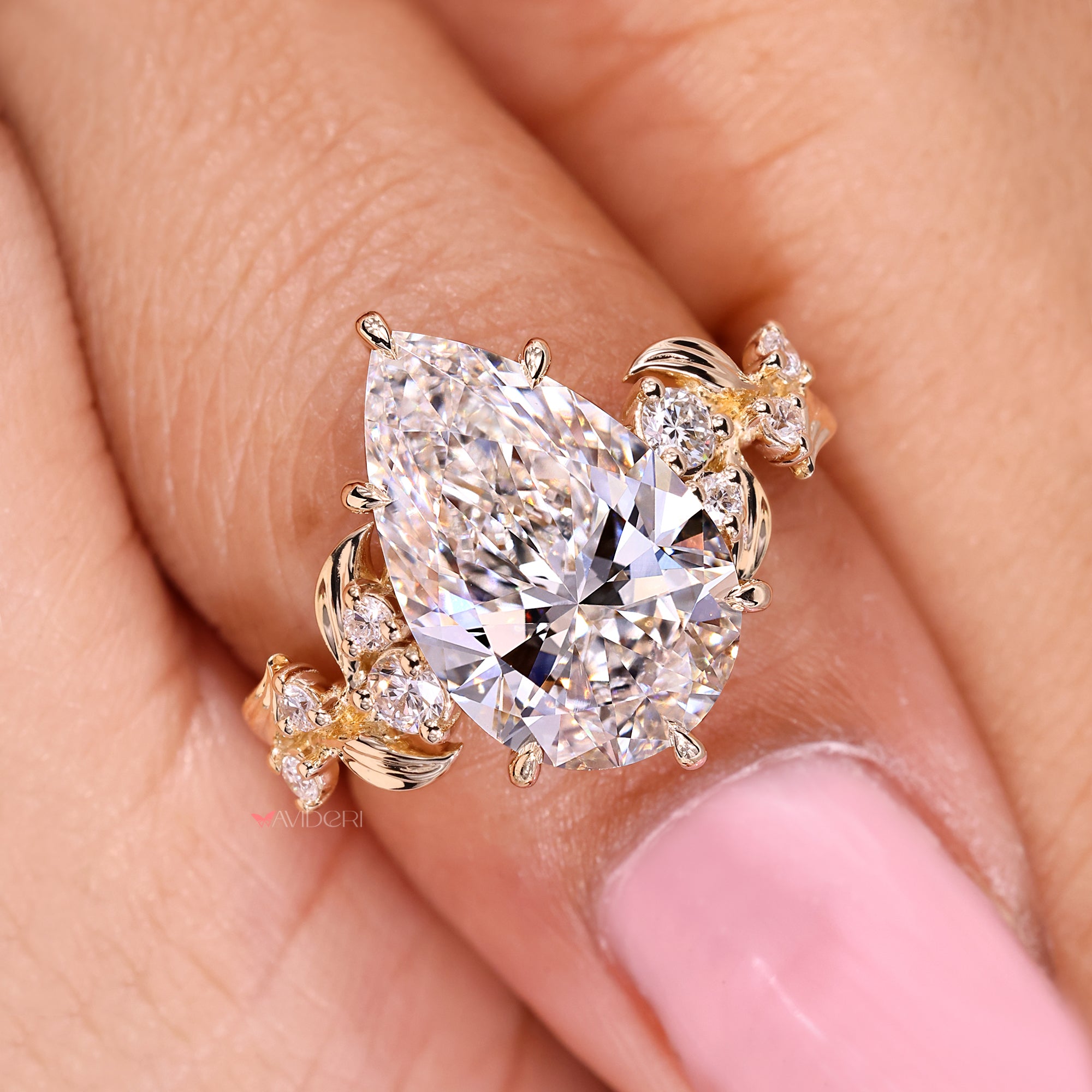 Handmade pear cut ring with organic cluster design.
