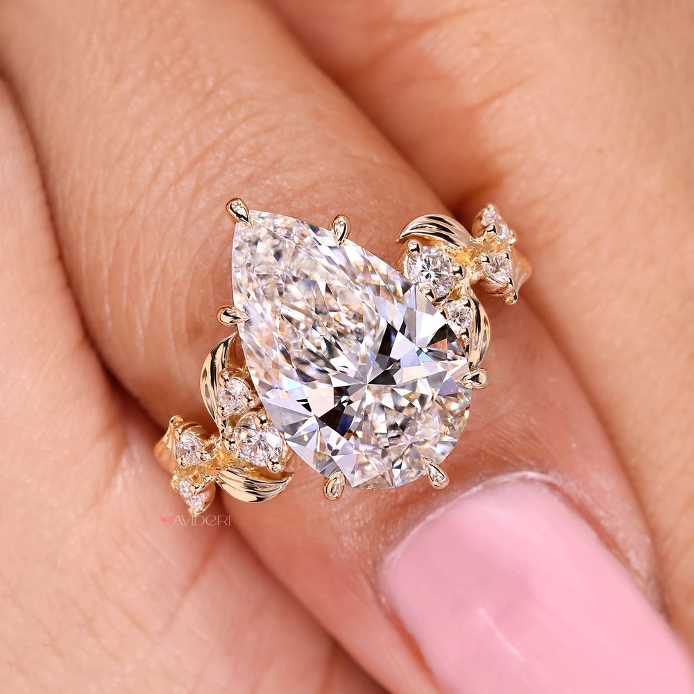 Handmade pear cut ring with organic cluster design.
