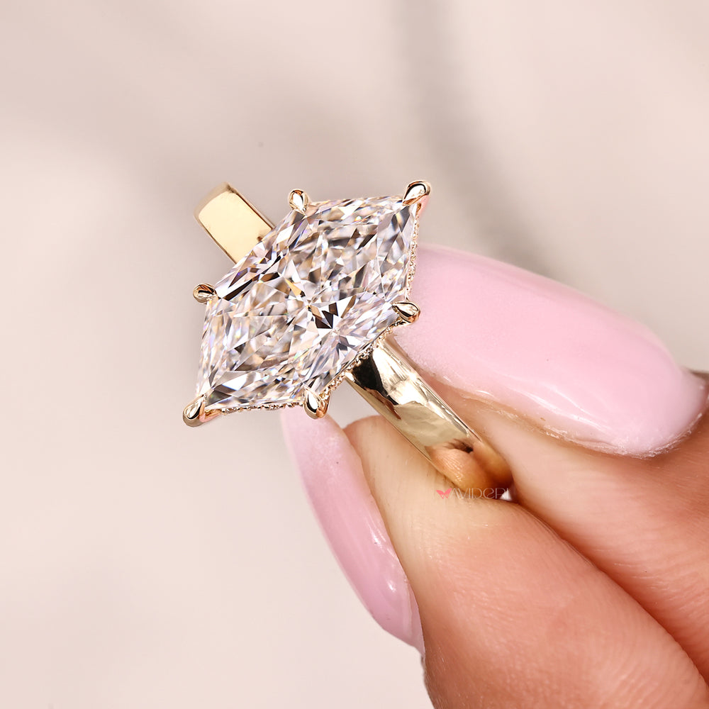 Dutch marquise engagement ring with hidden halo.