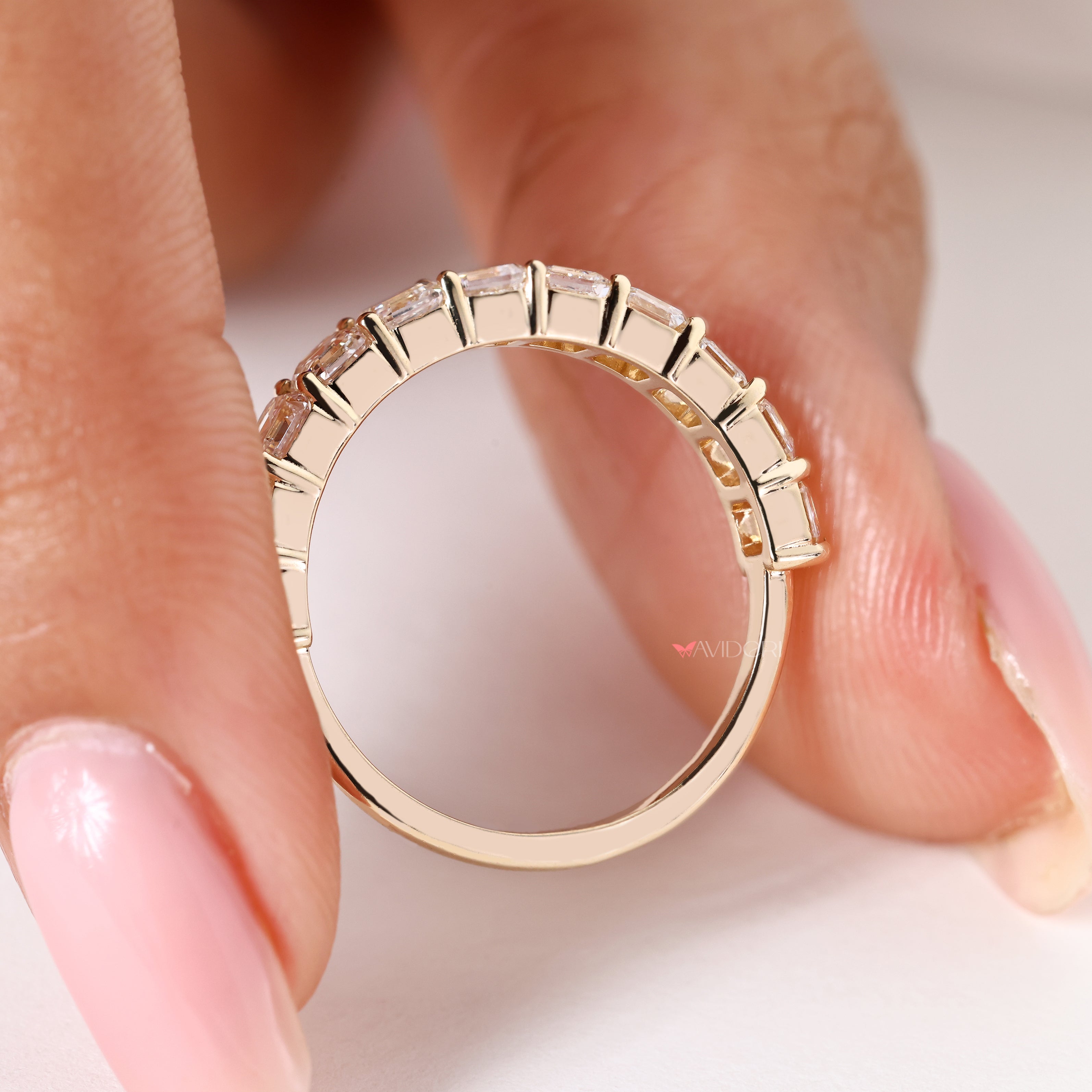 Handmade asscher cut diamond band with classic prong setting
