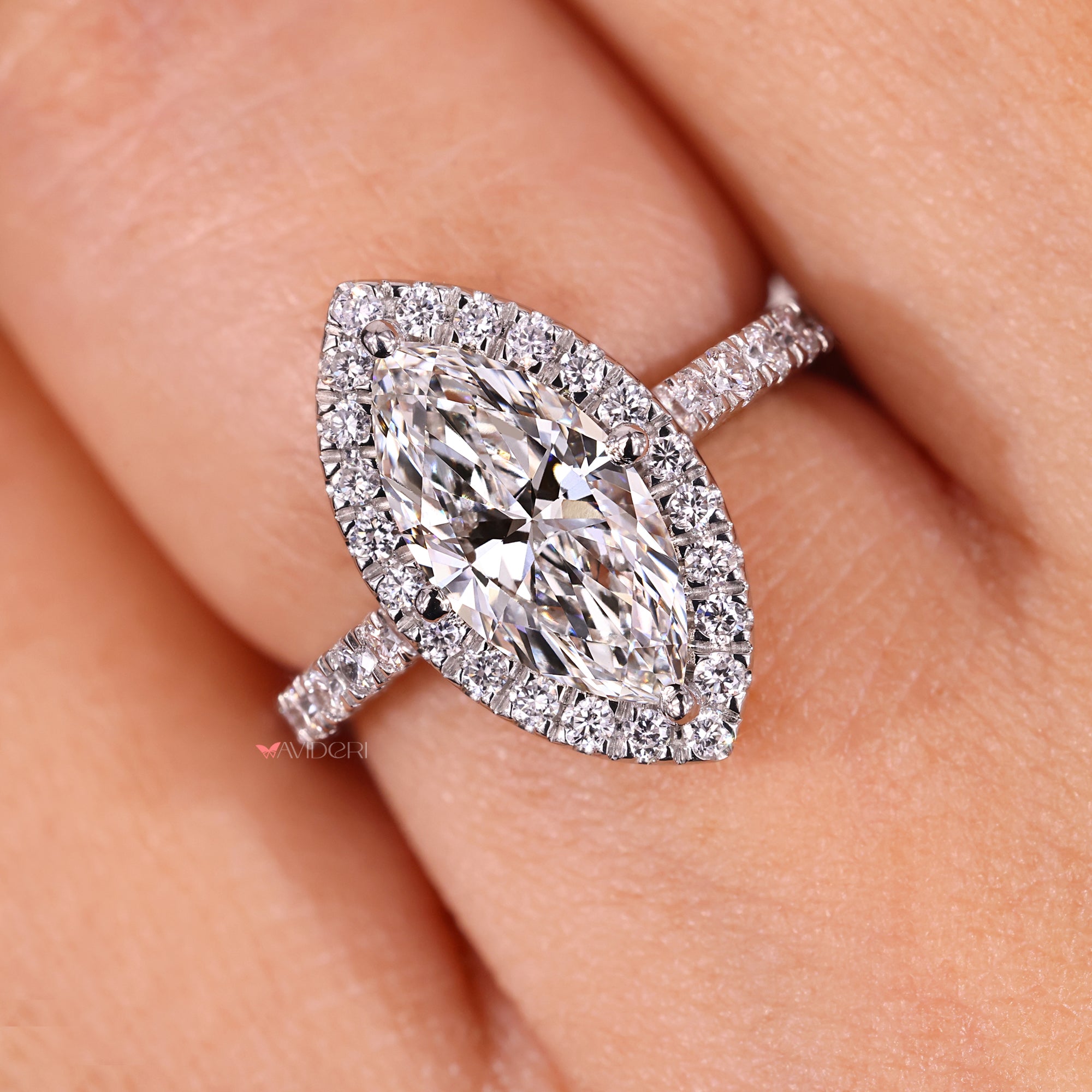 Avideri engagement ring in halo setting engagement ring.