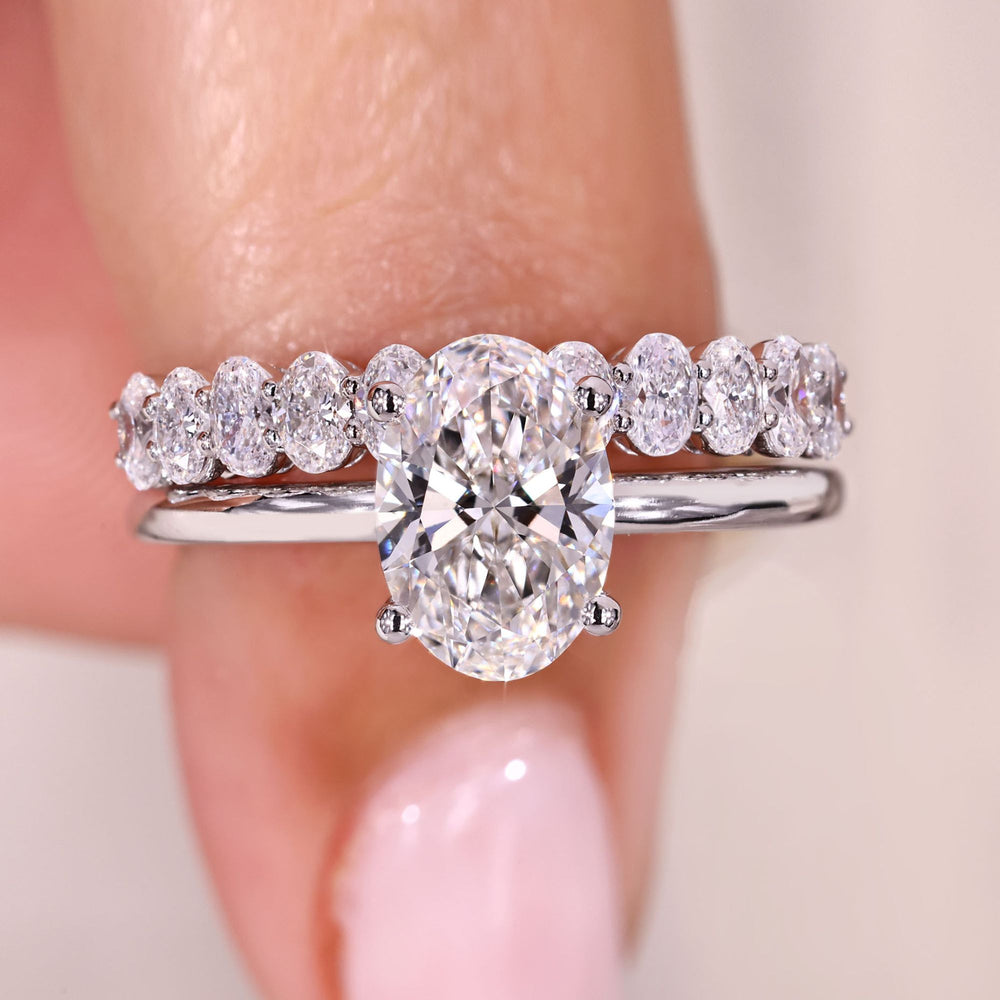 Oval cut diamond bridal set with solitaire ring.
