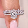 Oval cut diamond bridal set with solitaire ring.
