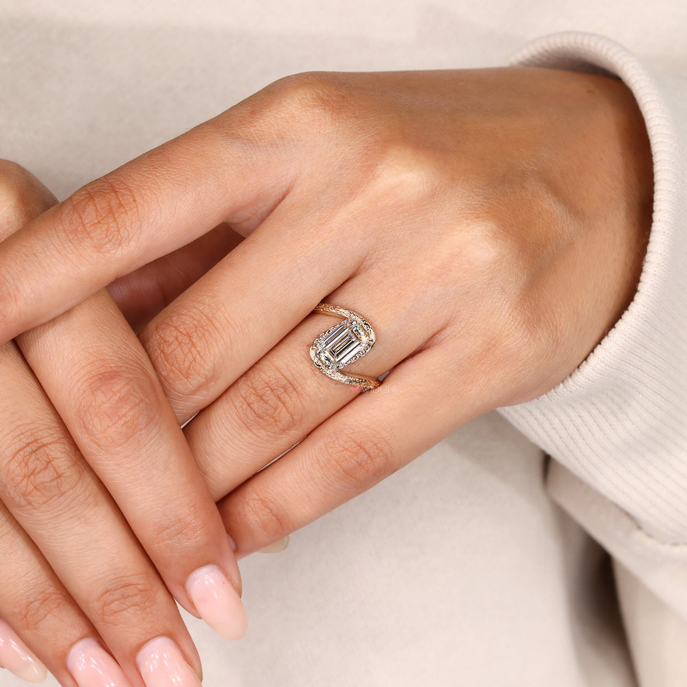 Lab grown emerald diamond ring with bypass shank.
