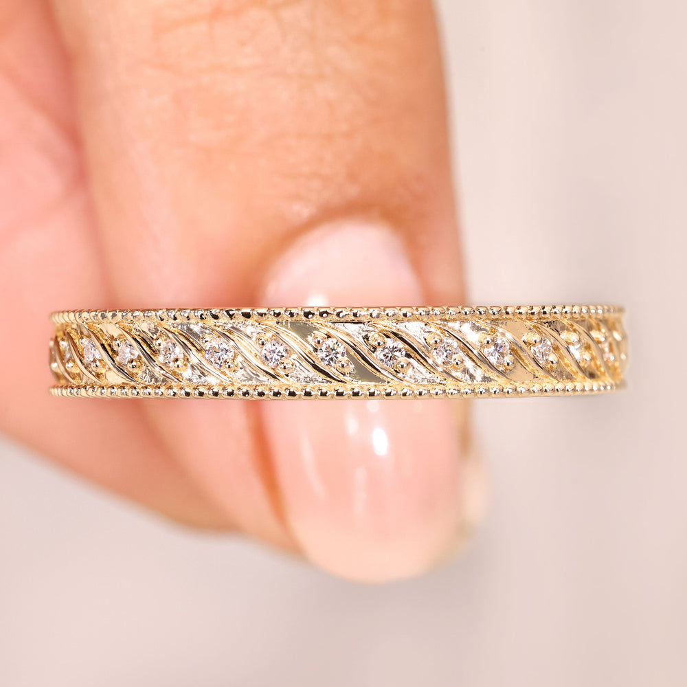 Vintage diamond wedding band eternity style.
