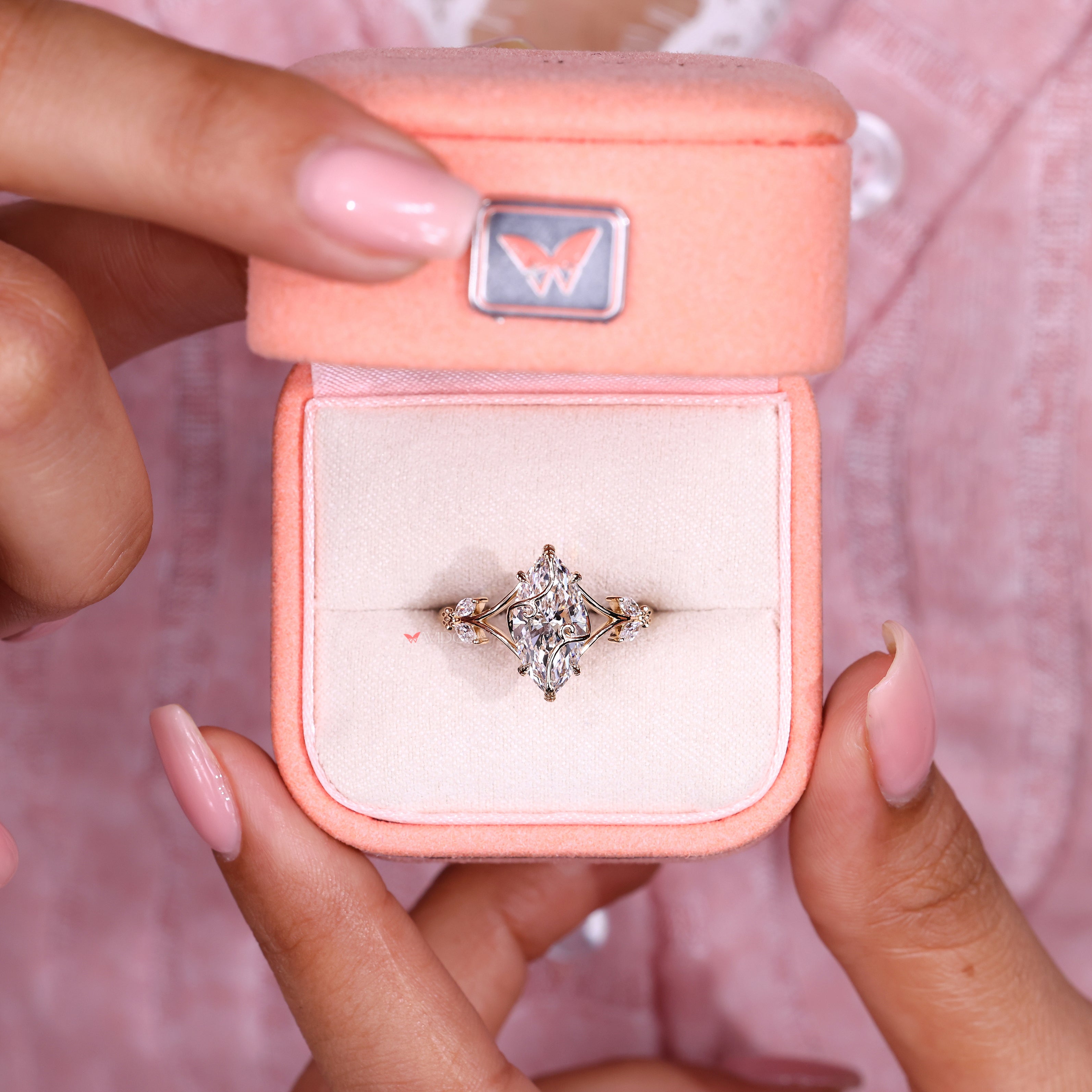 Lab grown marquise ring with tapered shank and basket

