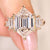 Hexagon cut diamond ring with baguette side stones.
