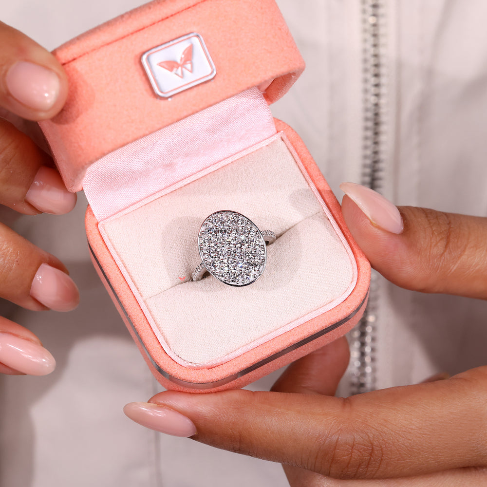 Lab grown diamond cluster ring with pave band style.
