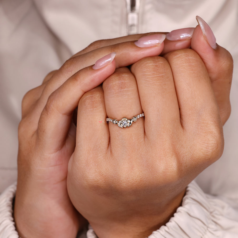 Round cut ring with claddagh pave style.
