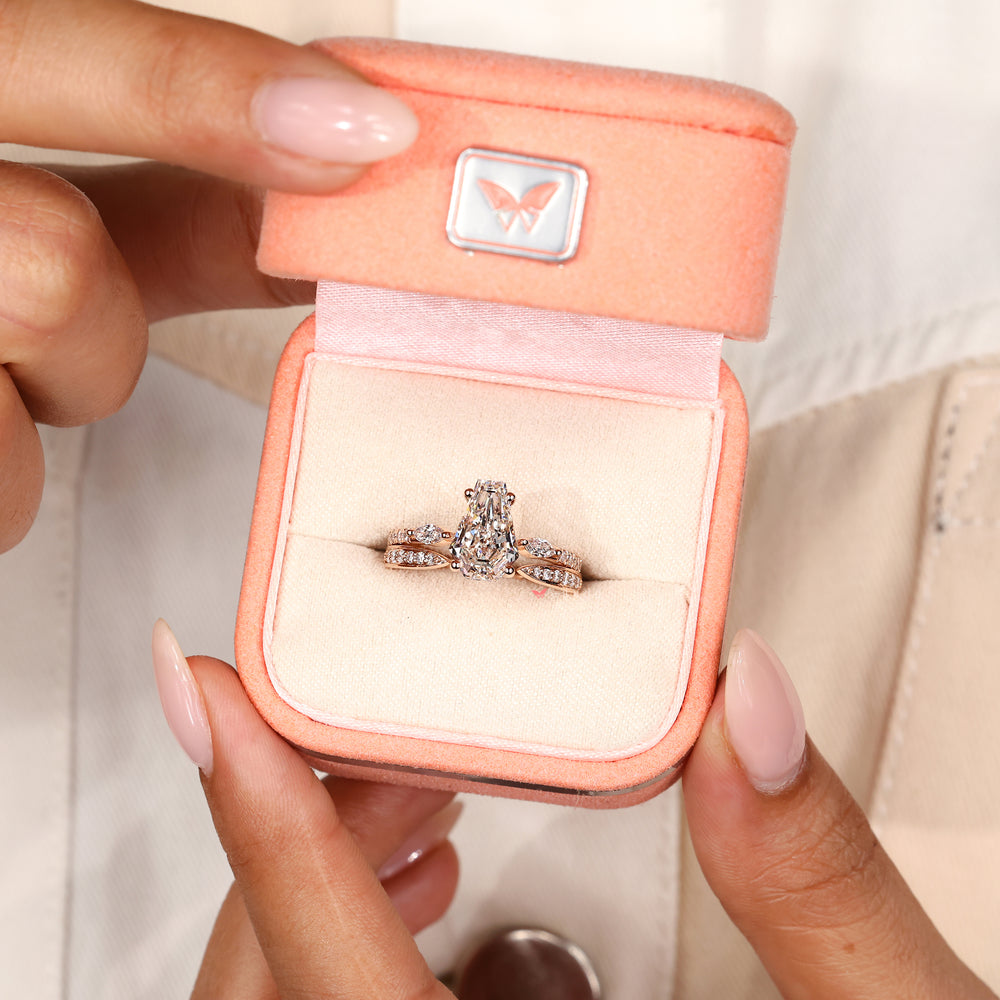 Open gap band with coffin diamond engagement ring.
