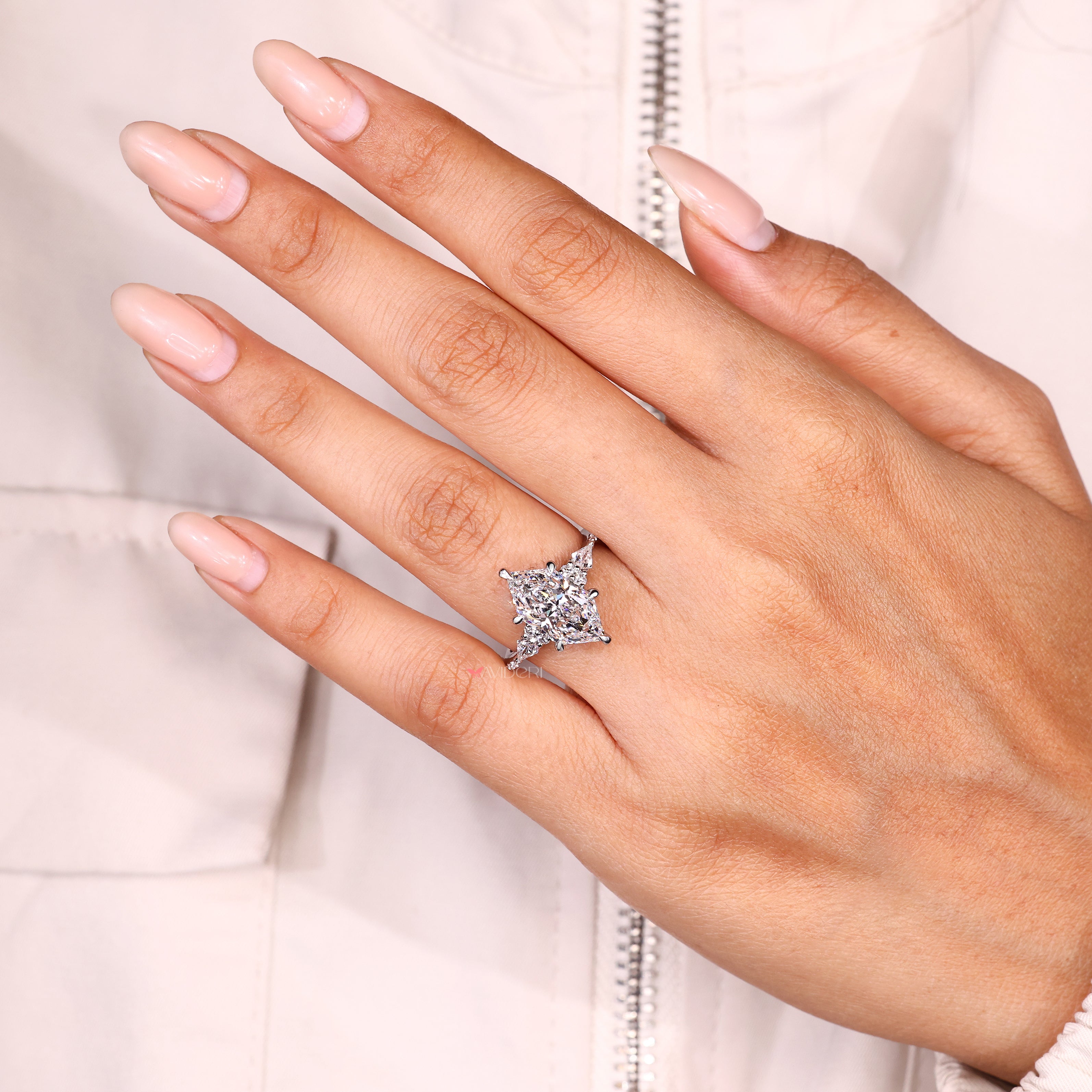 IGI certified marquise diamond ring with tapered shank band
