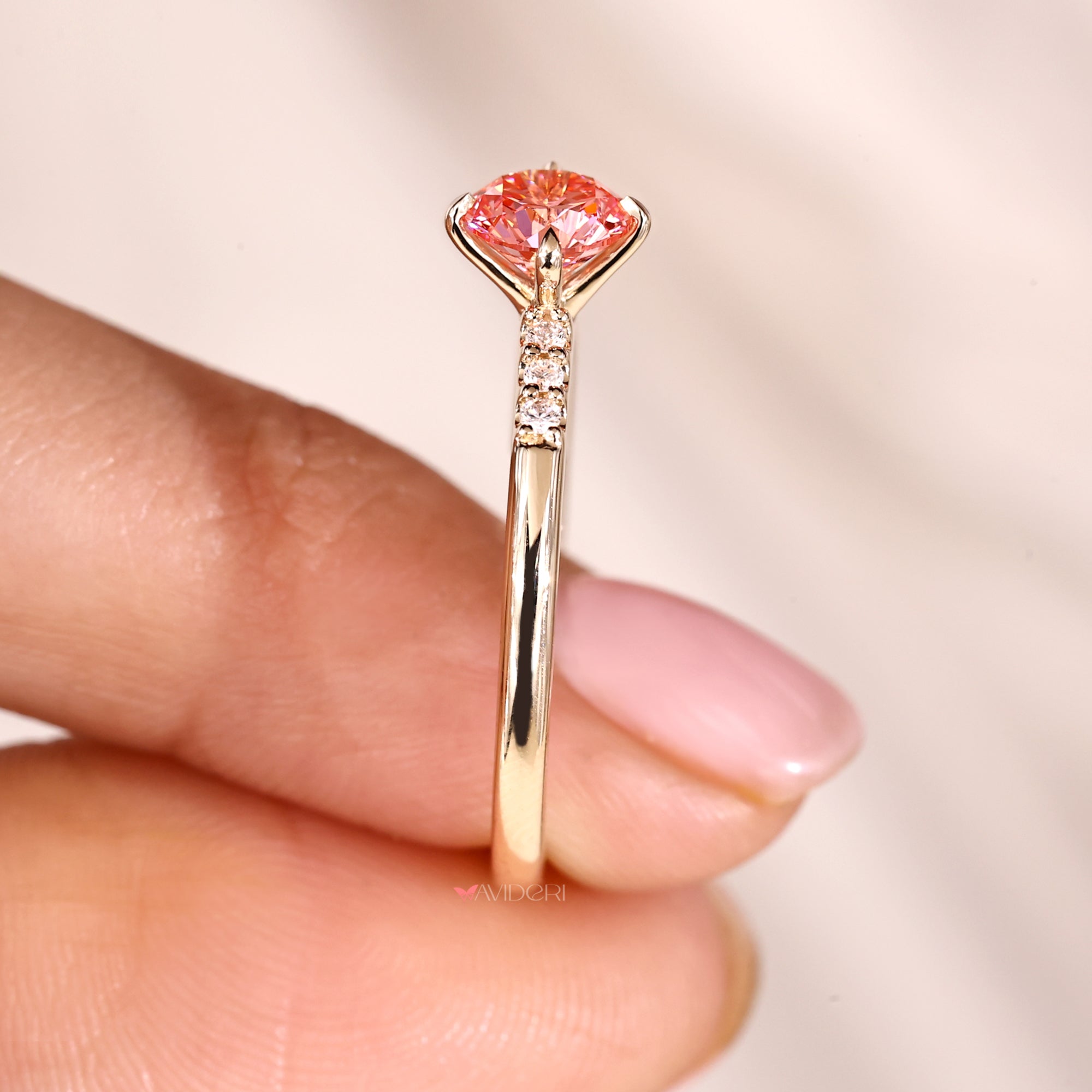 Custom diamond ring with 4 prong claw setting yellow gold.