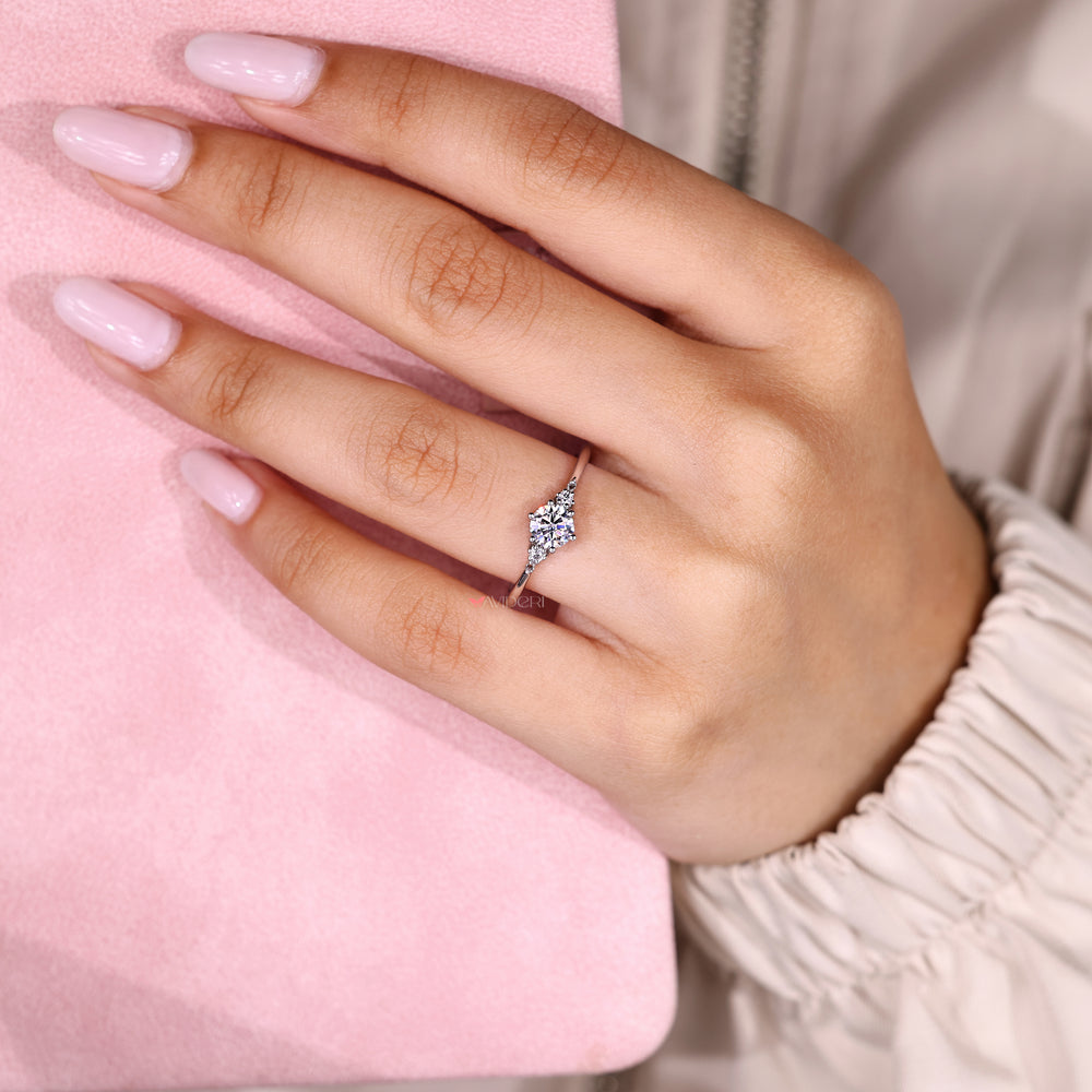 This round cut engagement ring captures brilliance with every angle.