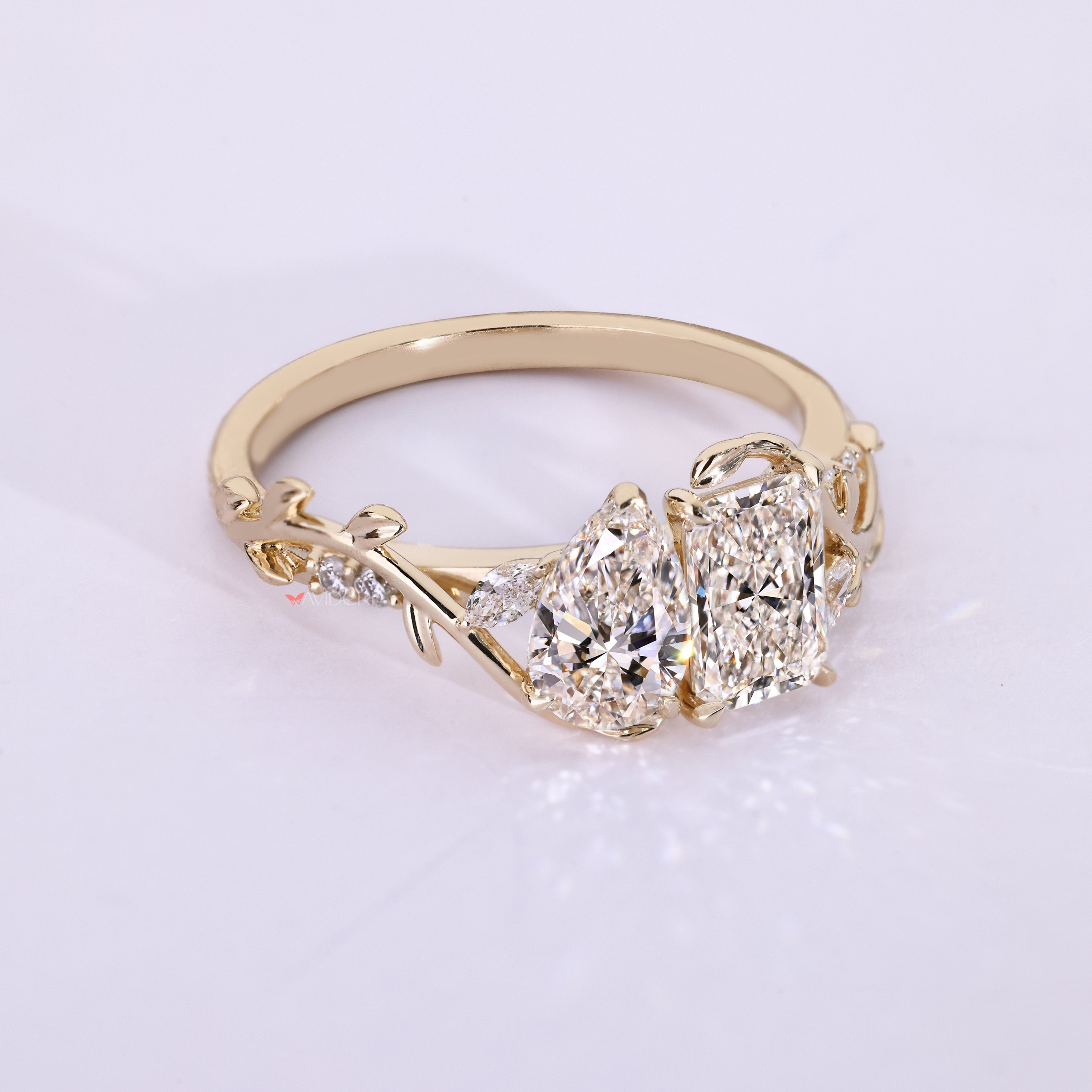 Nature inspired toi et moi lab grown diamond ring.
