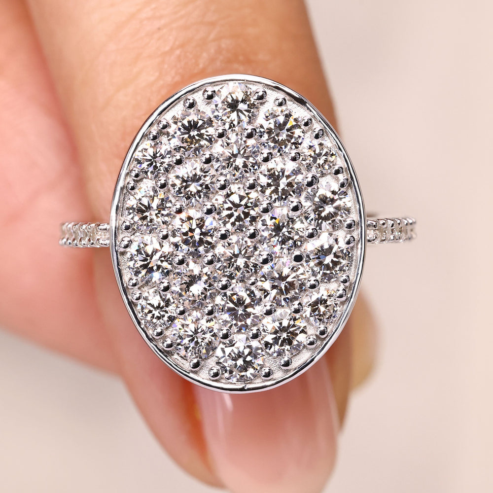 Round lab grown diamond ring with pave cluster setting.
