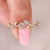 Nature inspired lab grown diamond wedding band with marquise and round stones.