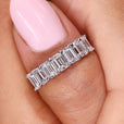 Emerald cut wedding band in diamond half eternity band.