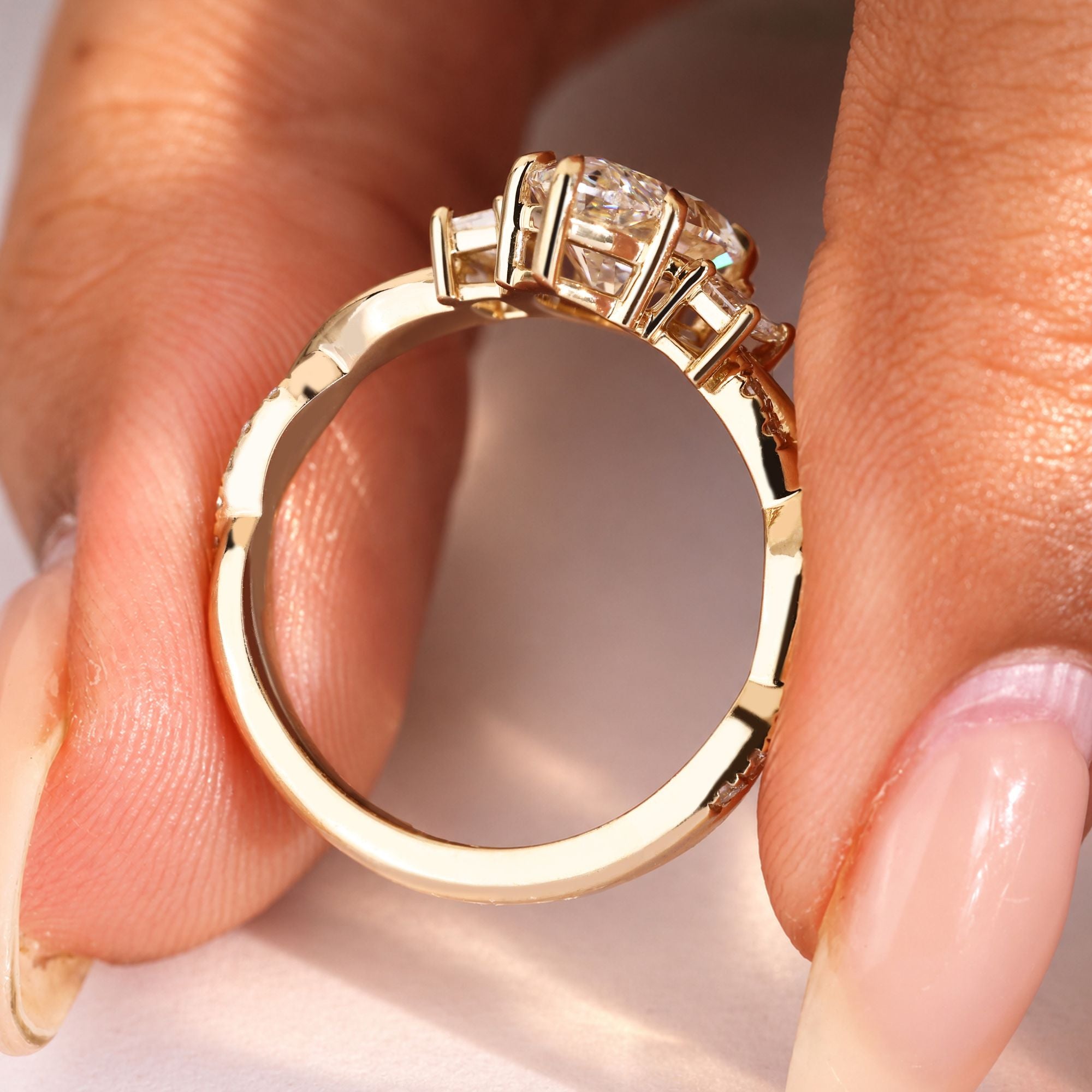 Pave marquise engagement ring with twisted shank.
