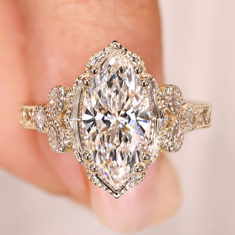 Marquise cut diamond ring with vintage art deco details
