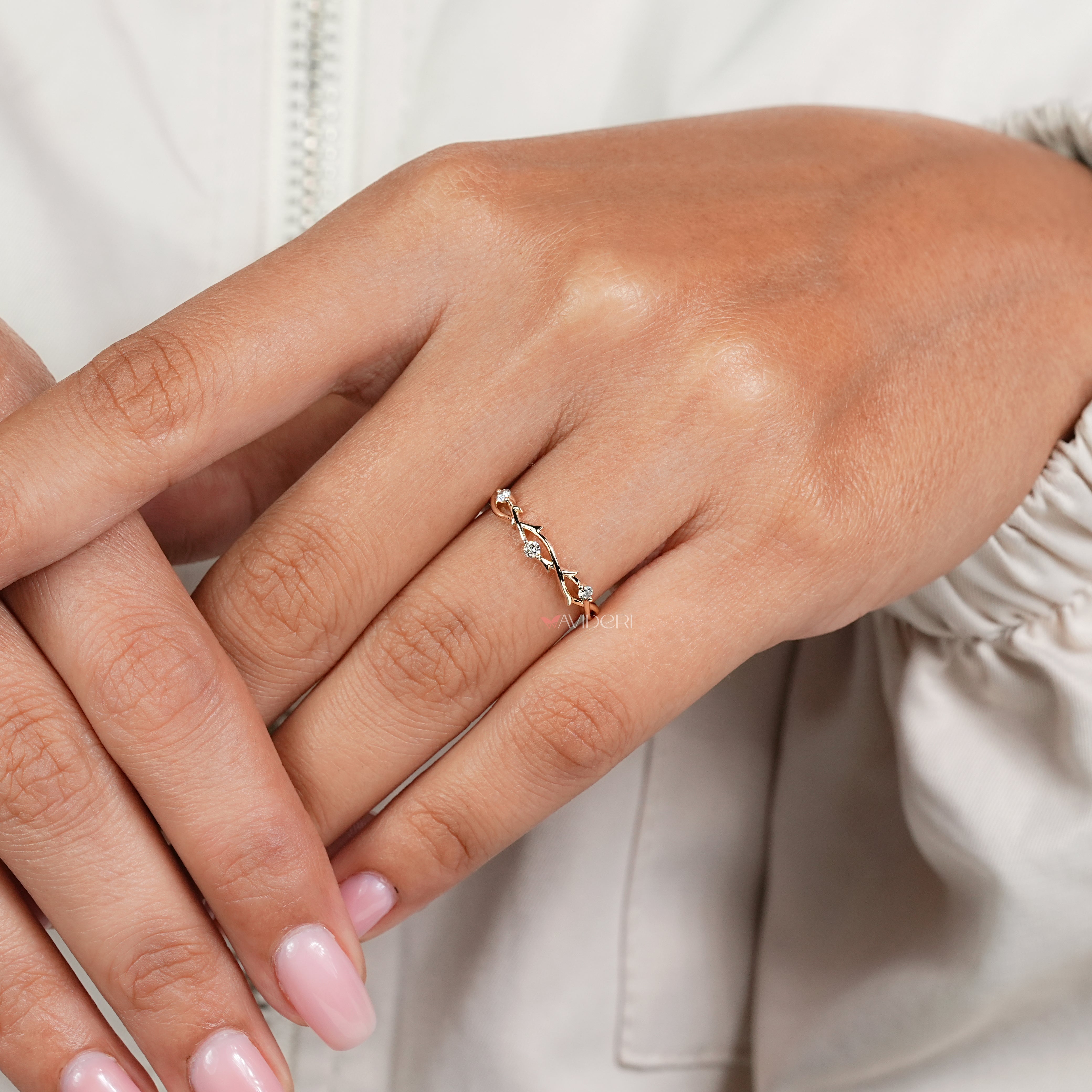 Nature inspired diamond wedding band with twisted design
