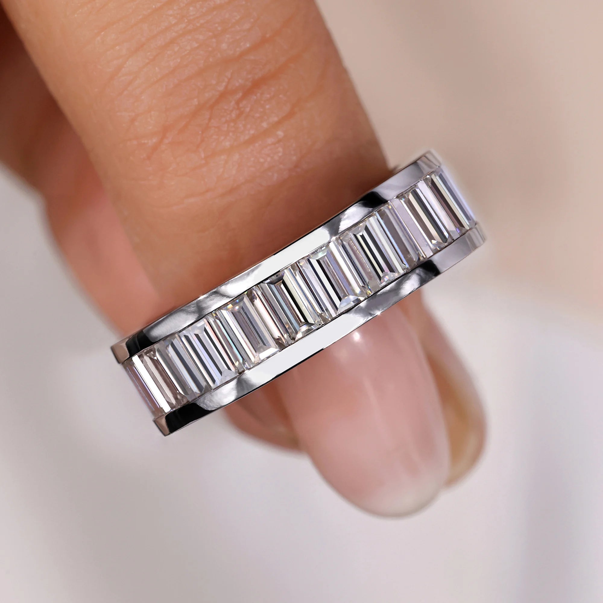 Baguette diamond wedding band in a sleek channel setting for modern elegance.