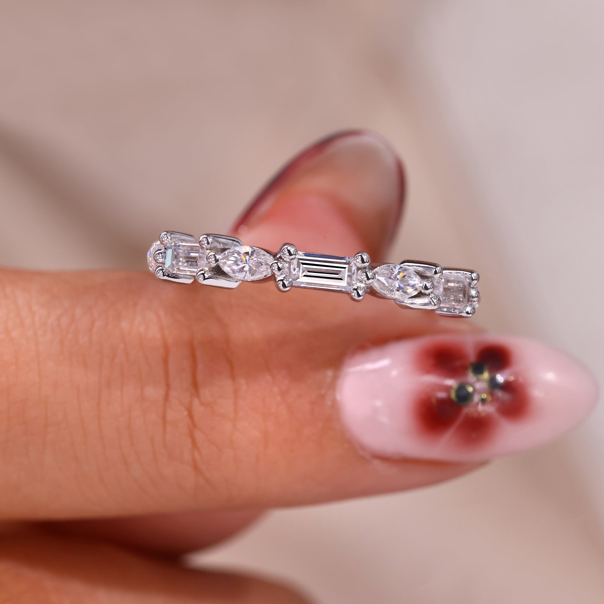 Elegant baguette and Marquise cut wedding band.
