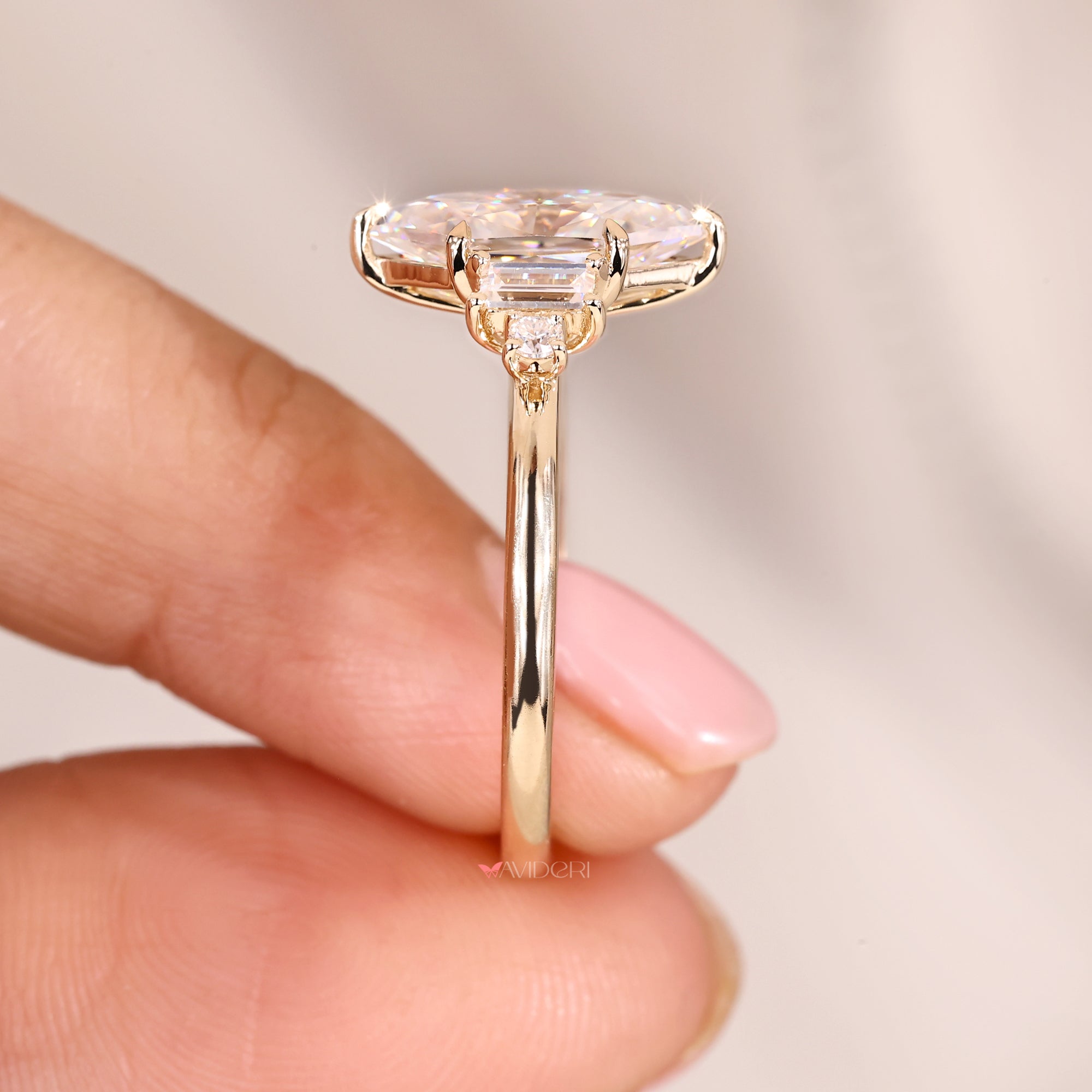 Avideri engagement ring with yellow gold engagement ring.