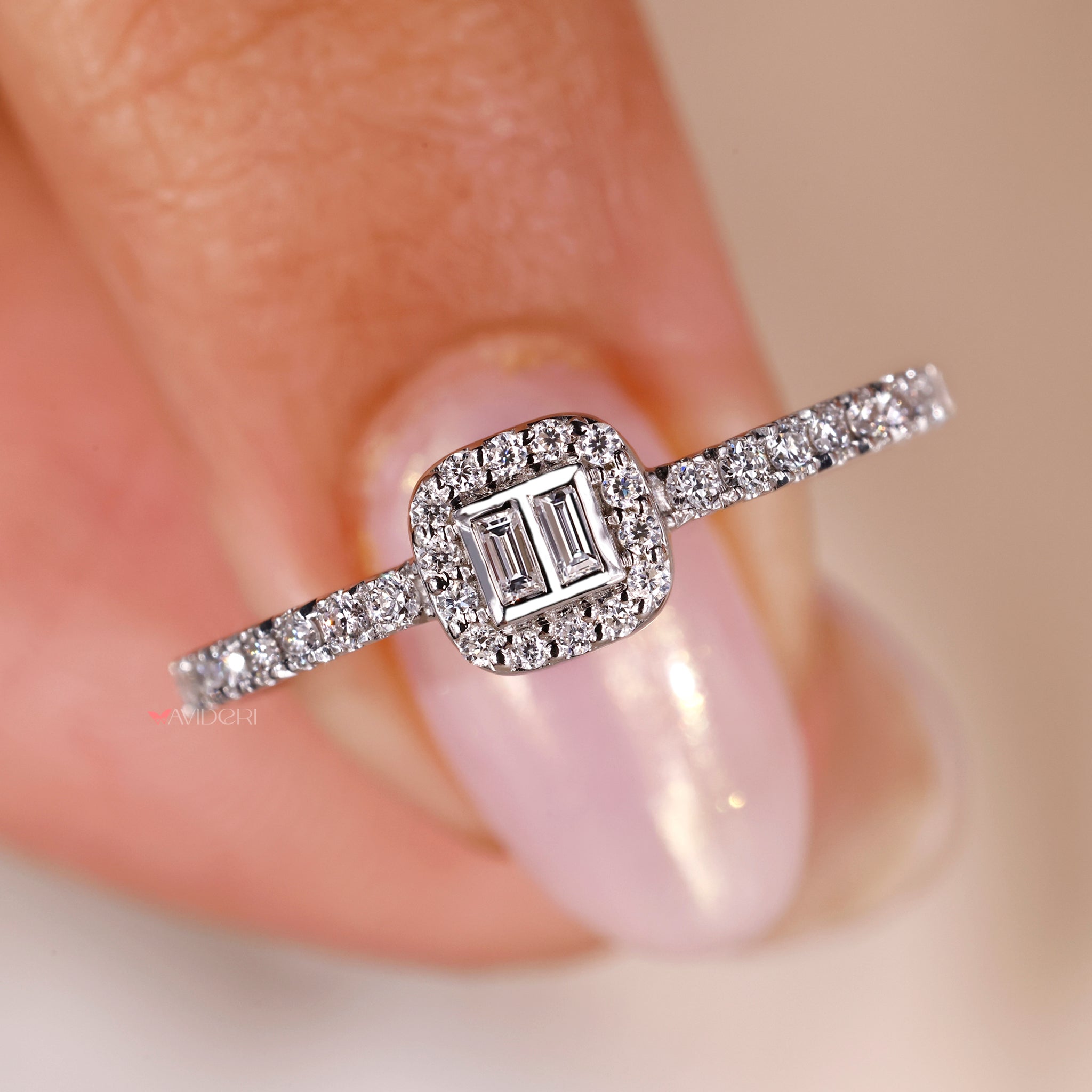 bezel setting engagement ring with custom design in handmade white gold.