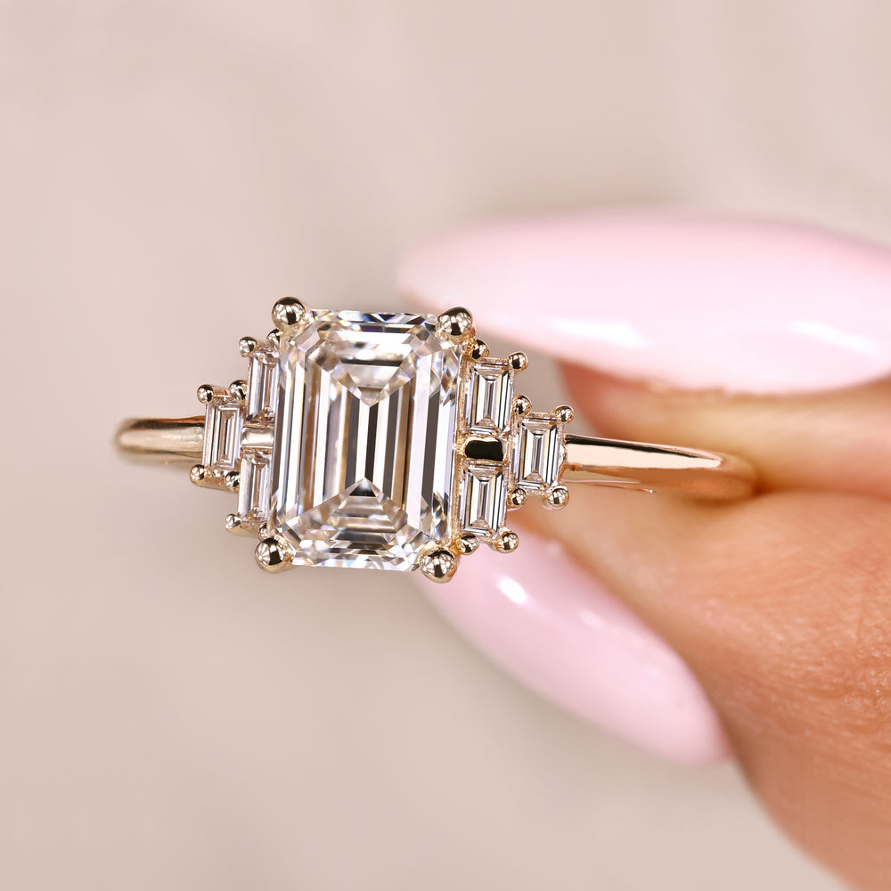 Lab grown emerald cut ring with seven stone design
