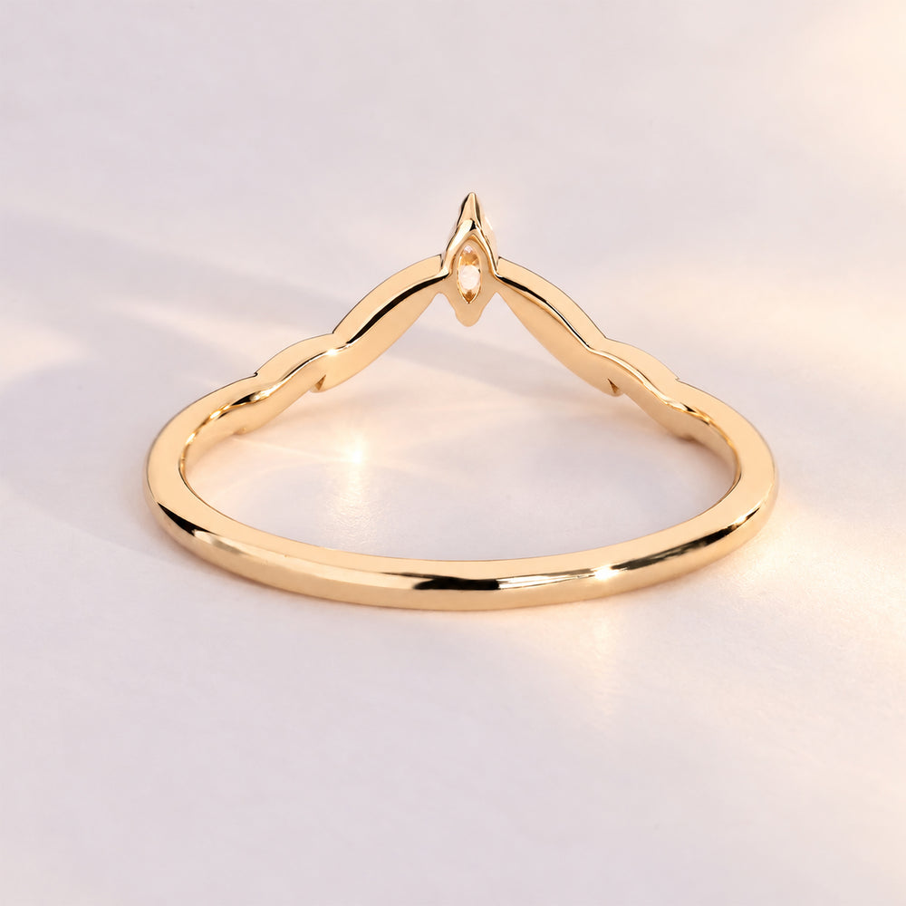 Handmade marquise diamond wedding band with a curve.
