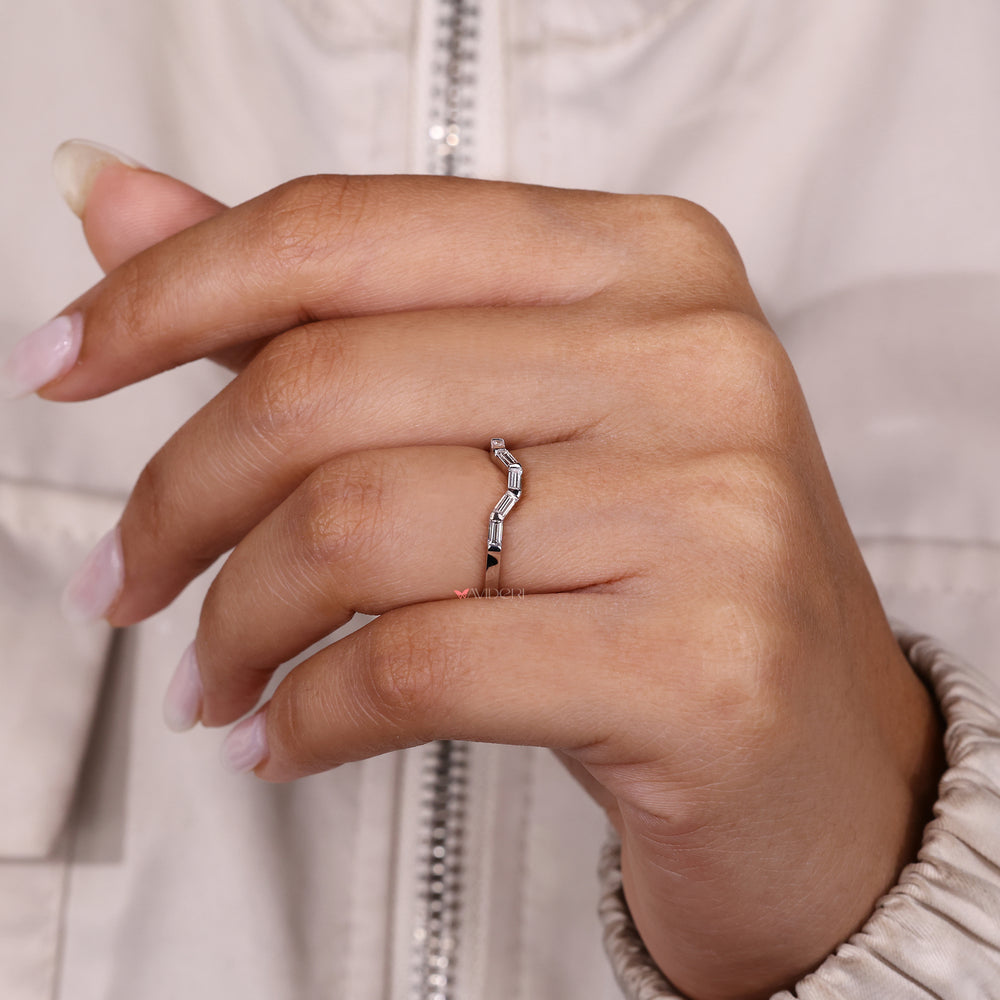 Handmade baguette diamond band with bar setting.
