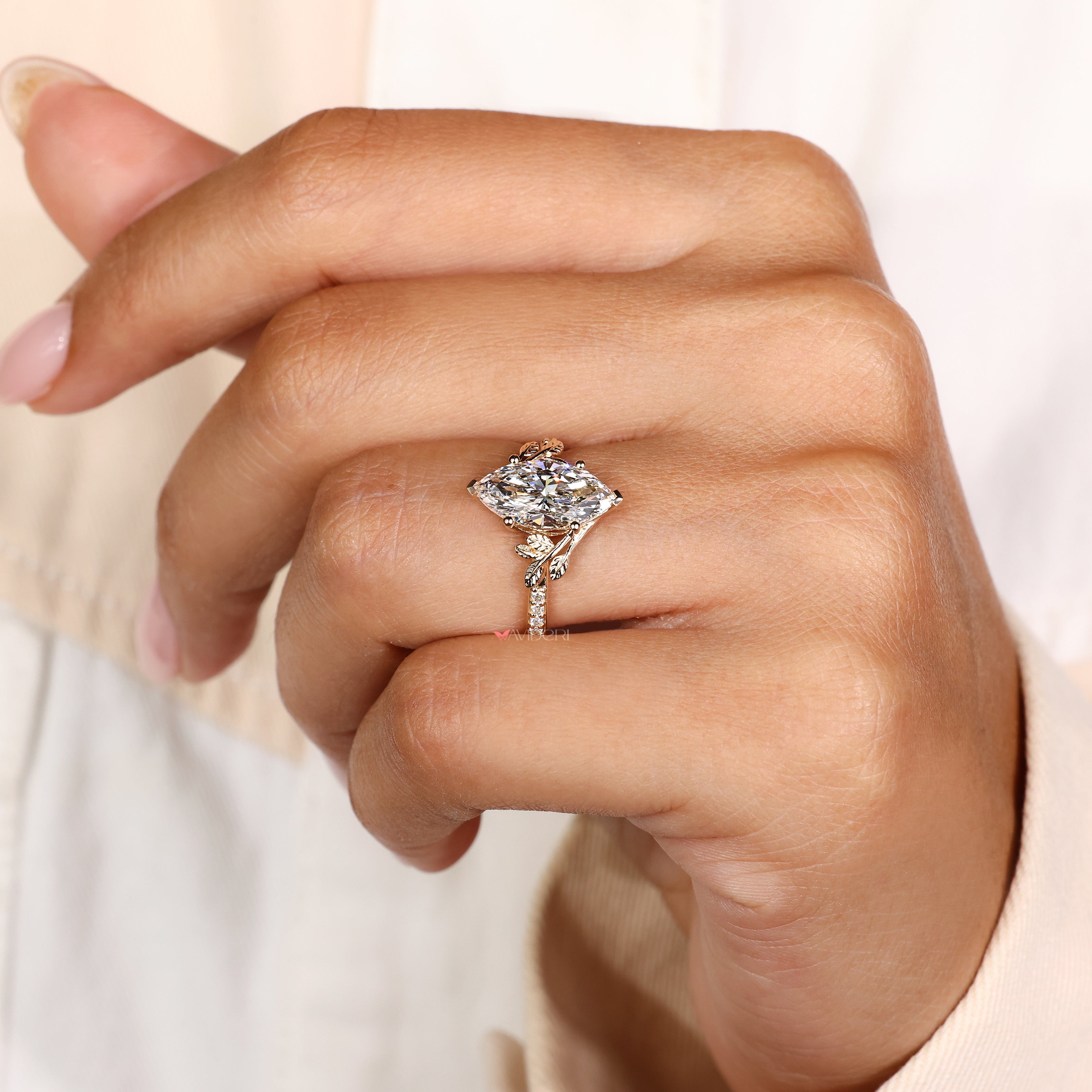 IGI certified marquise diamond ring with pave round diamonds
