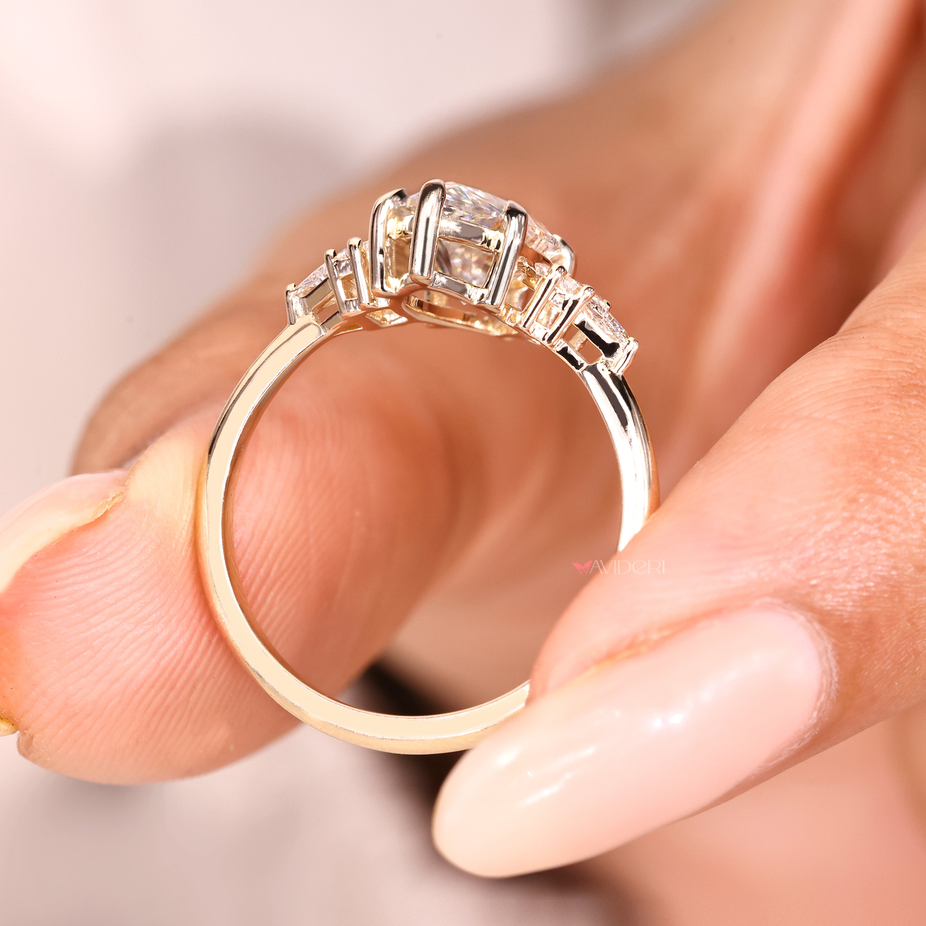 Lab grown marquise diamond ring with tapered shank design.
