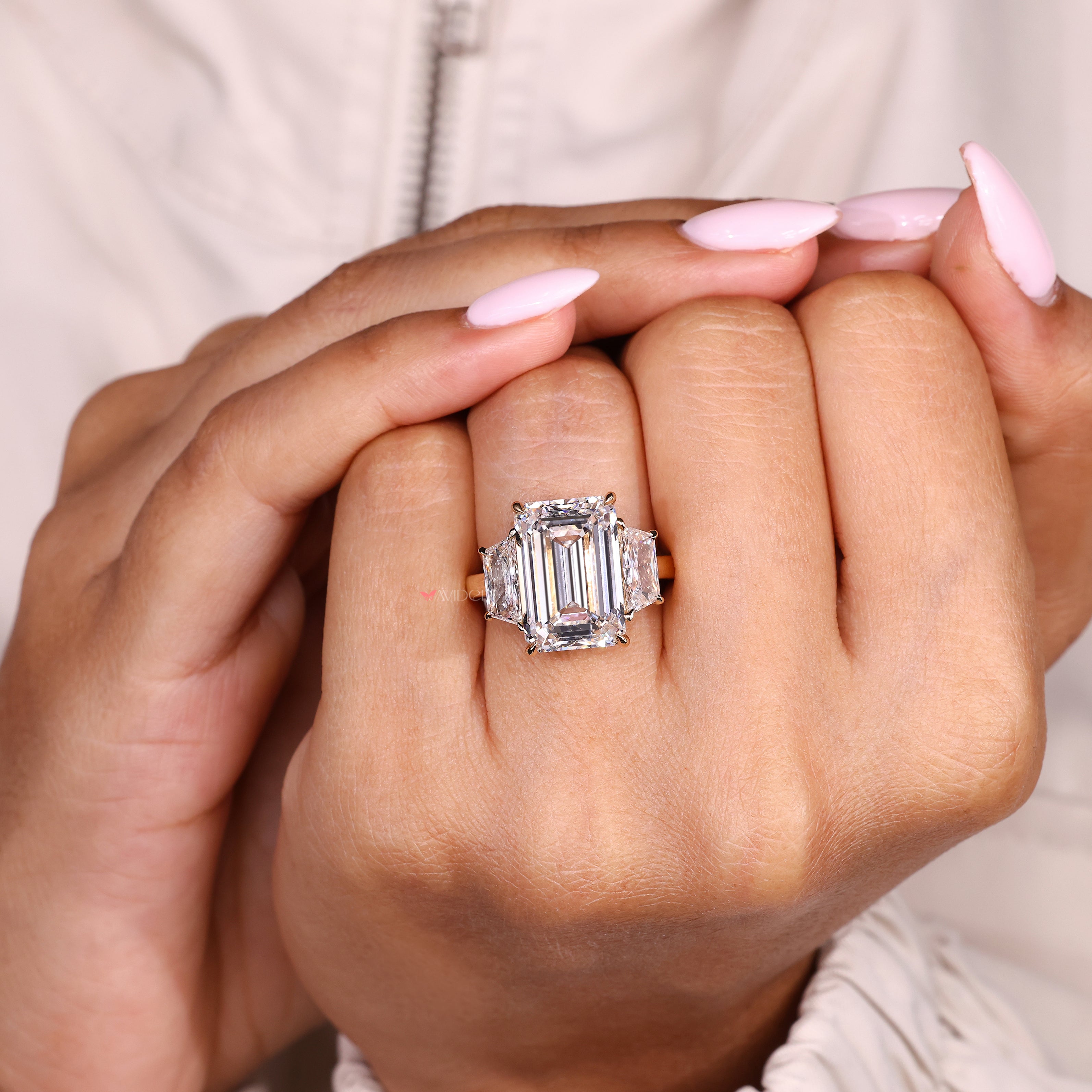 Emerald cut lab diamond ring with trapezoid side accents

