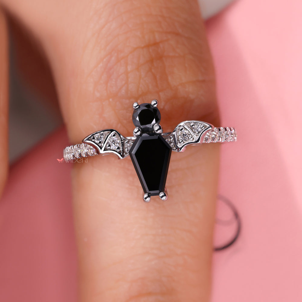 Moissanite engagement ring with bat bird shape ring.