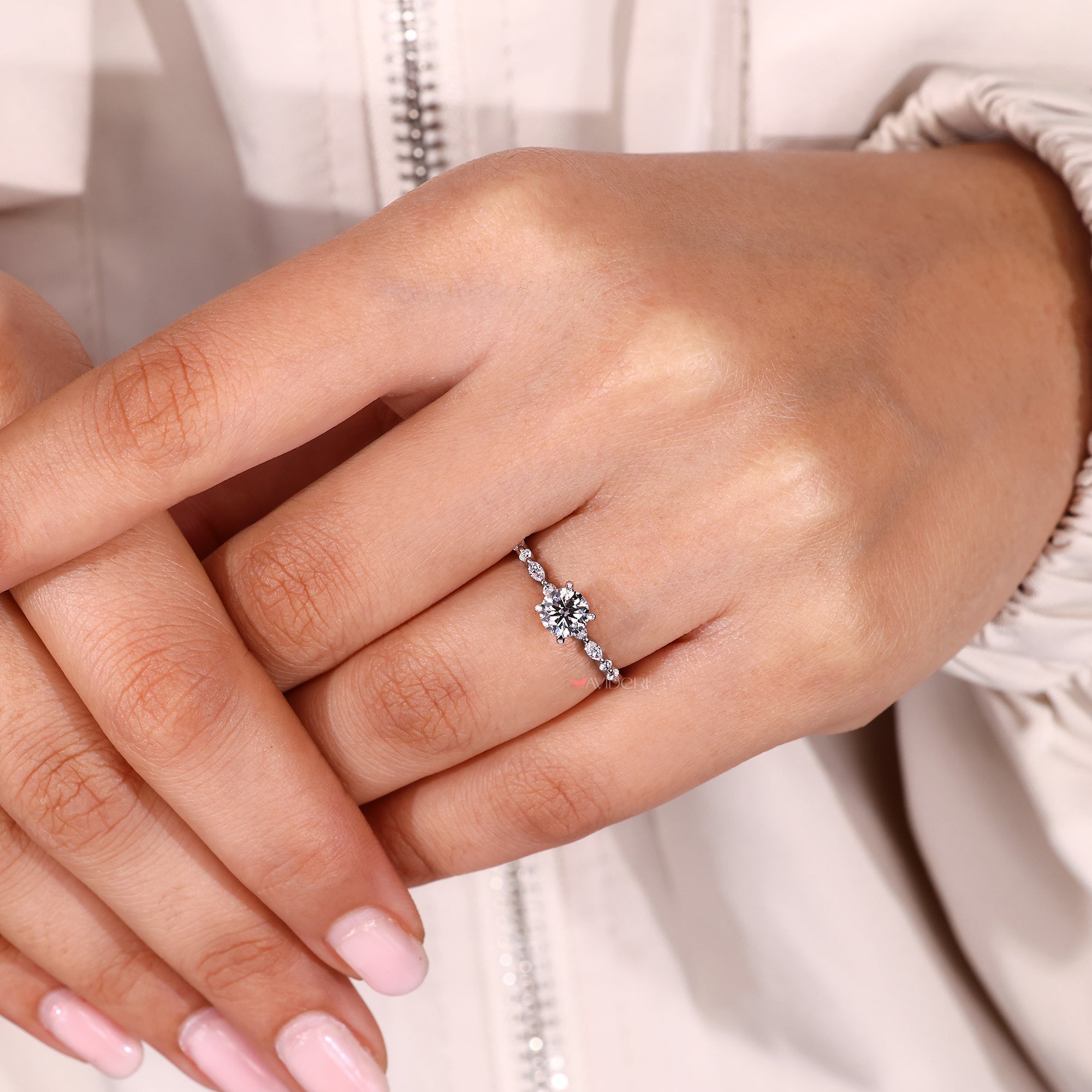 Avideri engagement ring with a 4 claw prong setting.