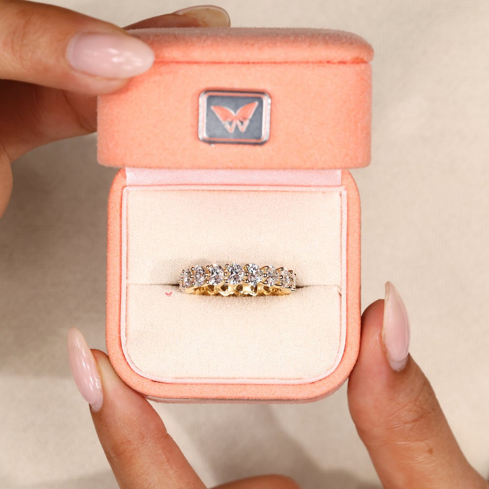 Shared prong heart cut diamond band style.
