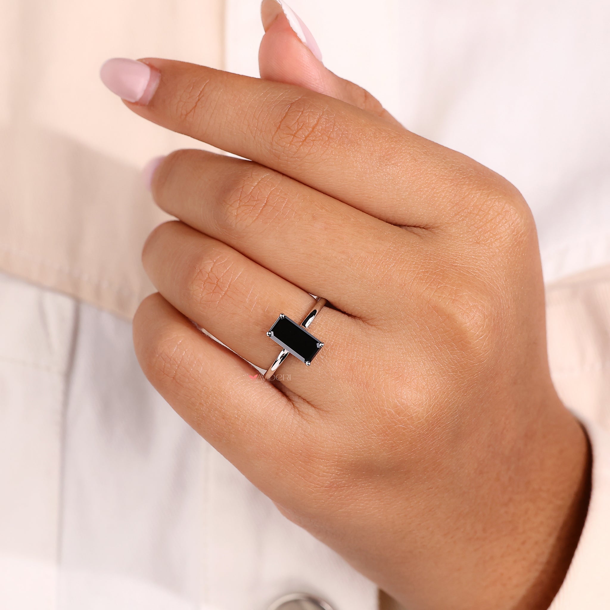 Solitaire engagement ring with a 4 prong setting.