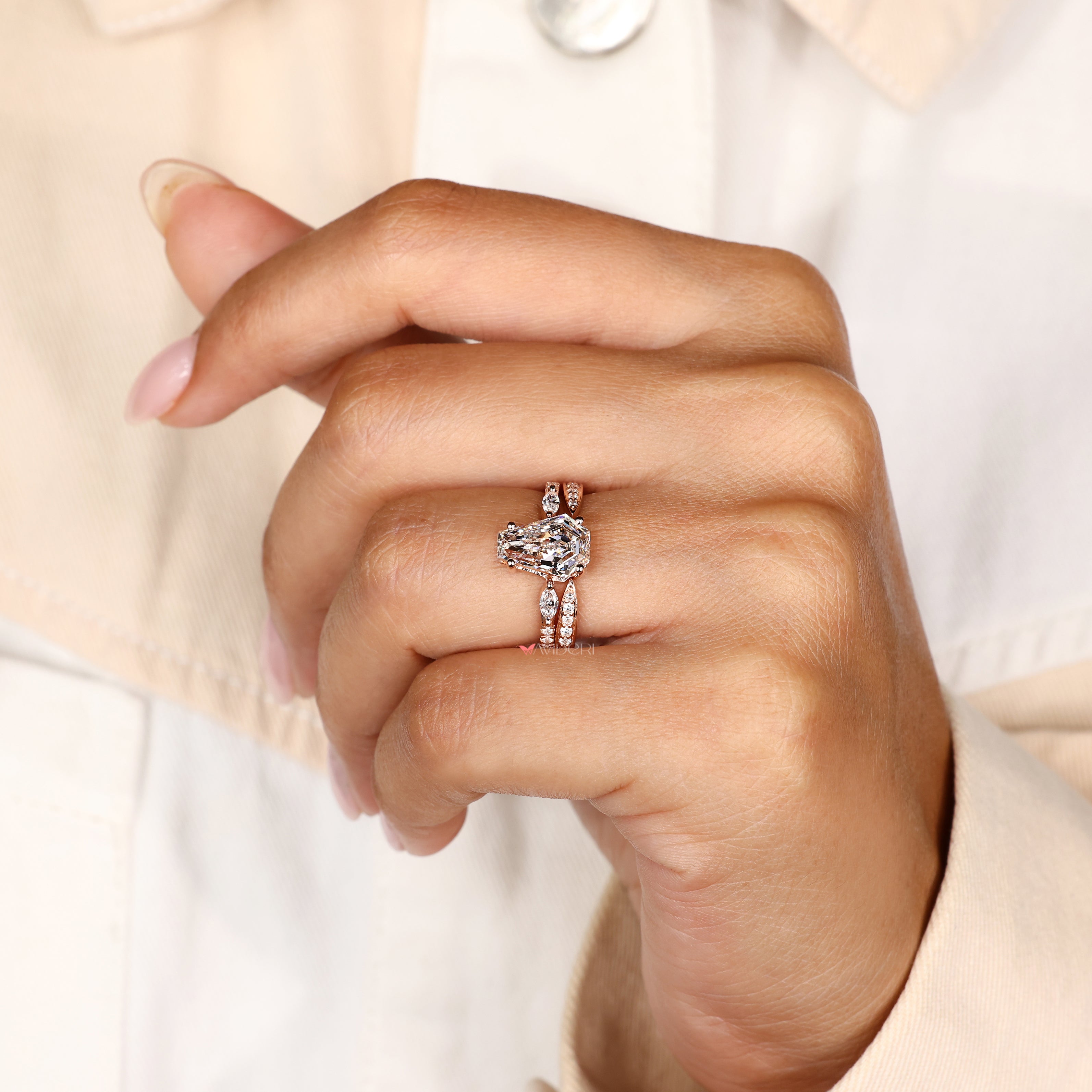Coffin cut ring with four prong setting style.
