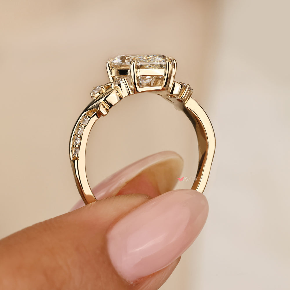 IGI certified marquise diamond ring with nature inspired details
