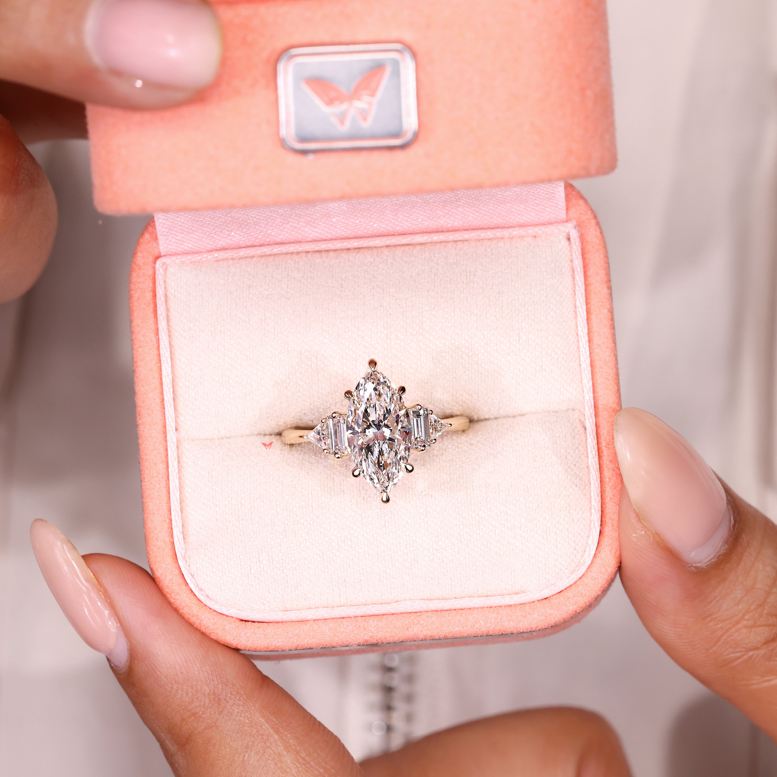 IGI certified marquise ring with six claw prong setting.
