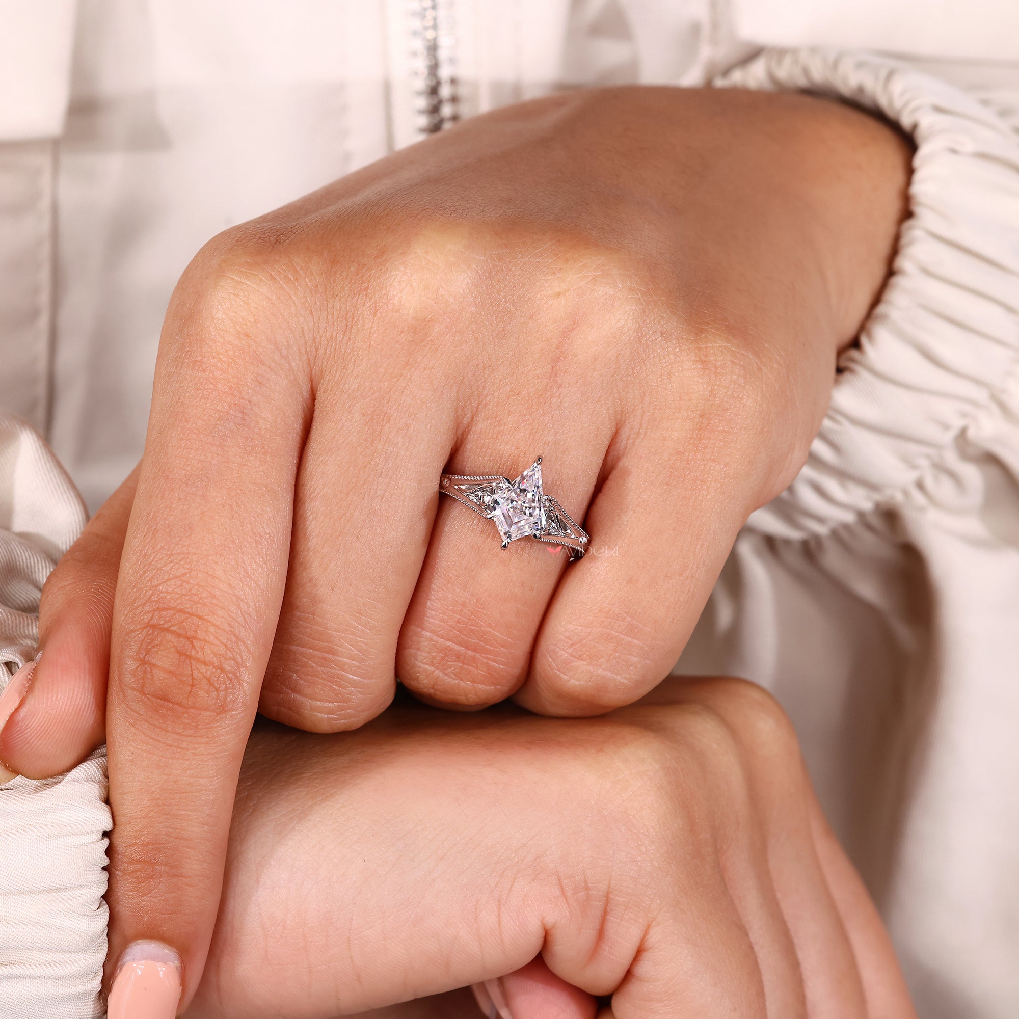 Vintage diamond engagement ring with milgrain setting.