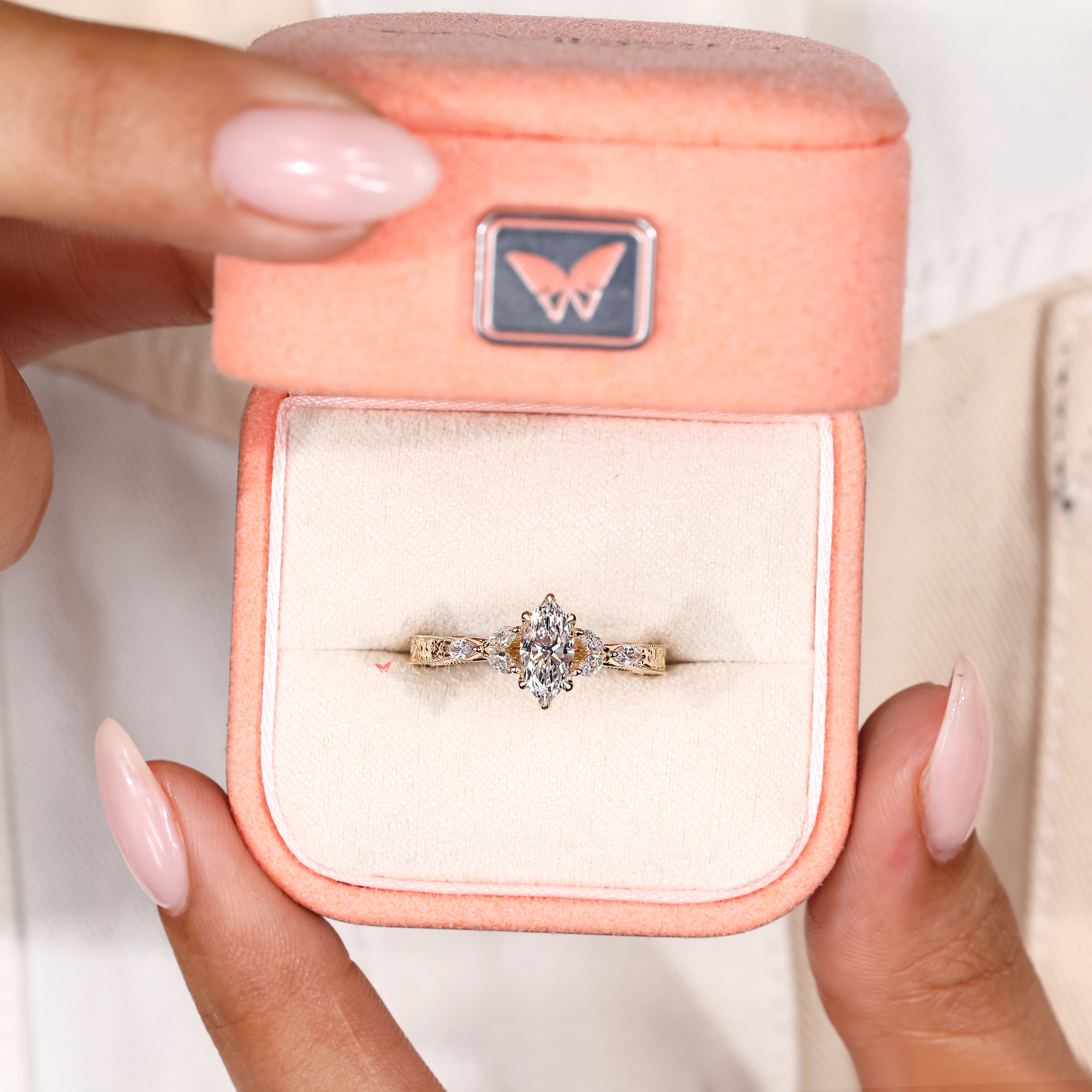 Muse setting marquise engagement ring handmade.
