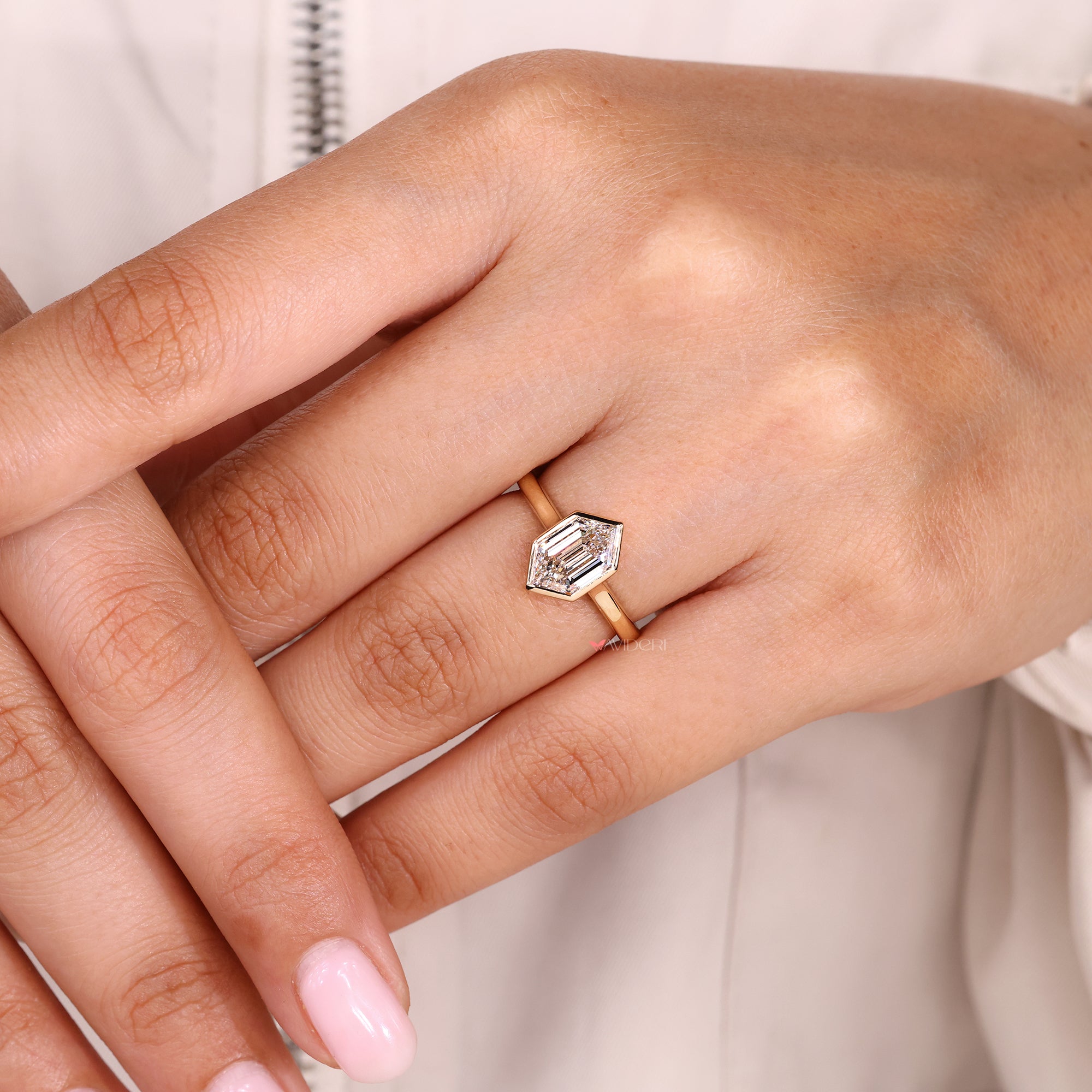Handmade jewelry with bezel cathedral ring.
