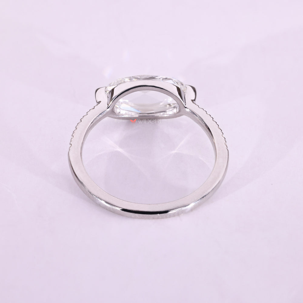 White gold diamond ring with an east west setting.